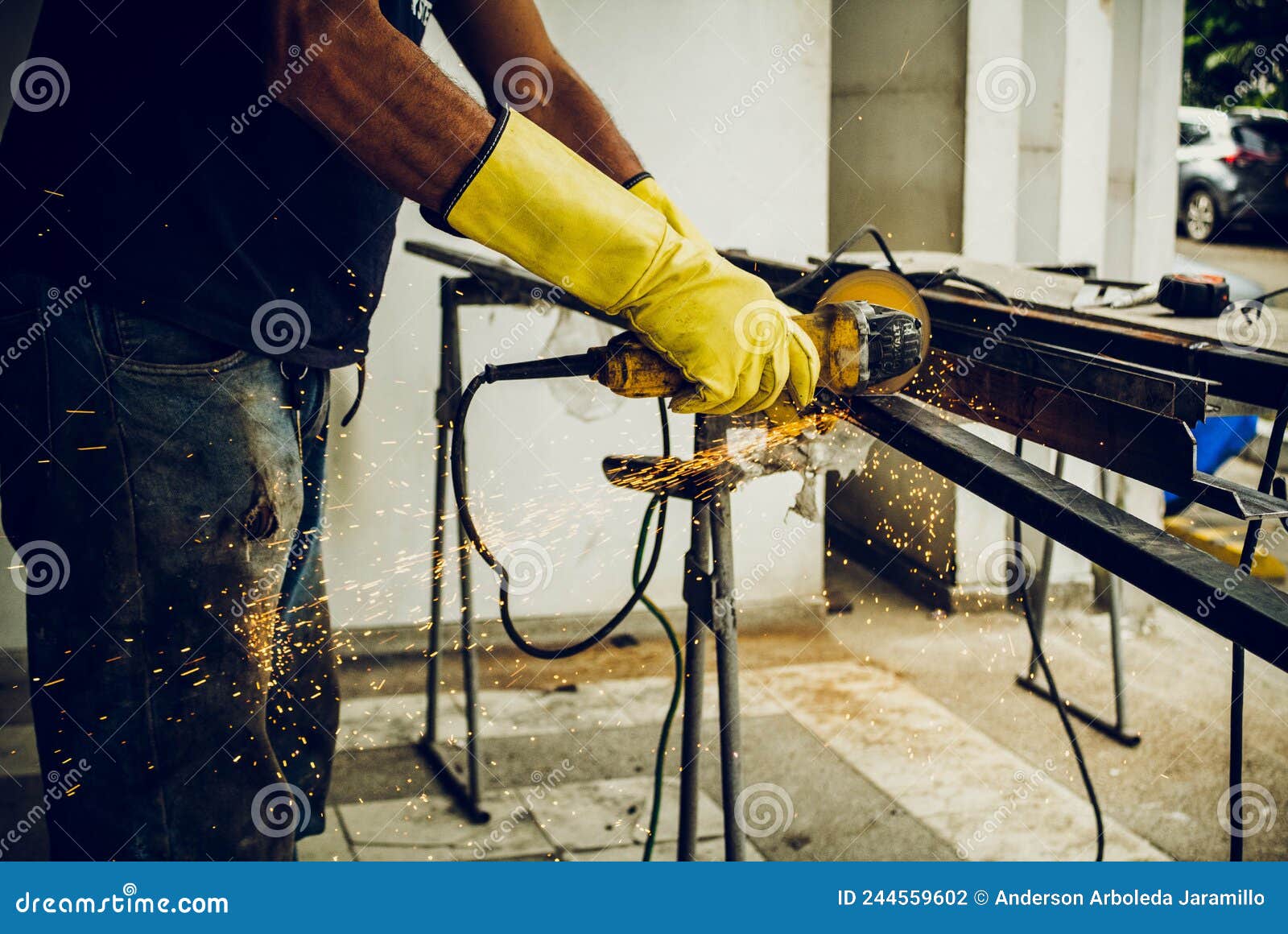 man working with construction tool