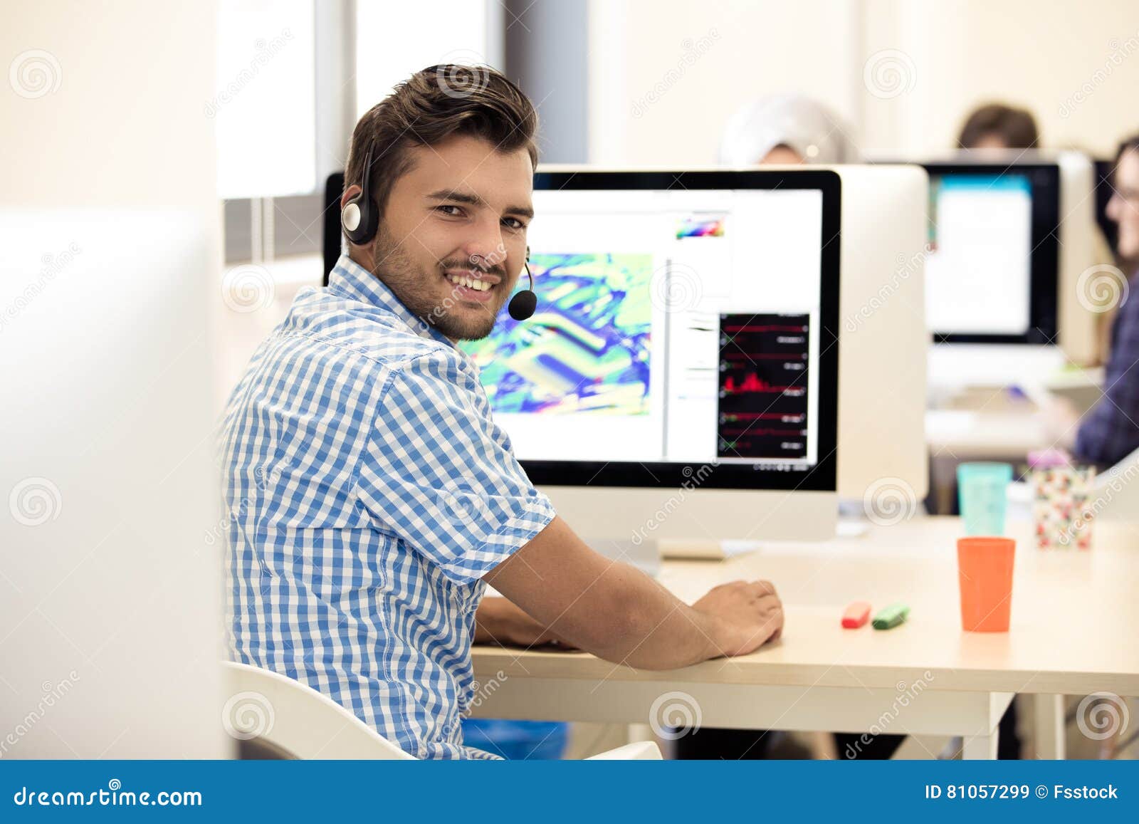 Man Working At Desk In Busy Creative Office Stock Image Image Of