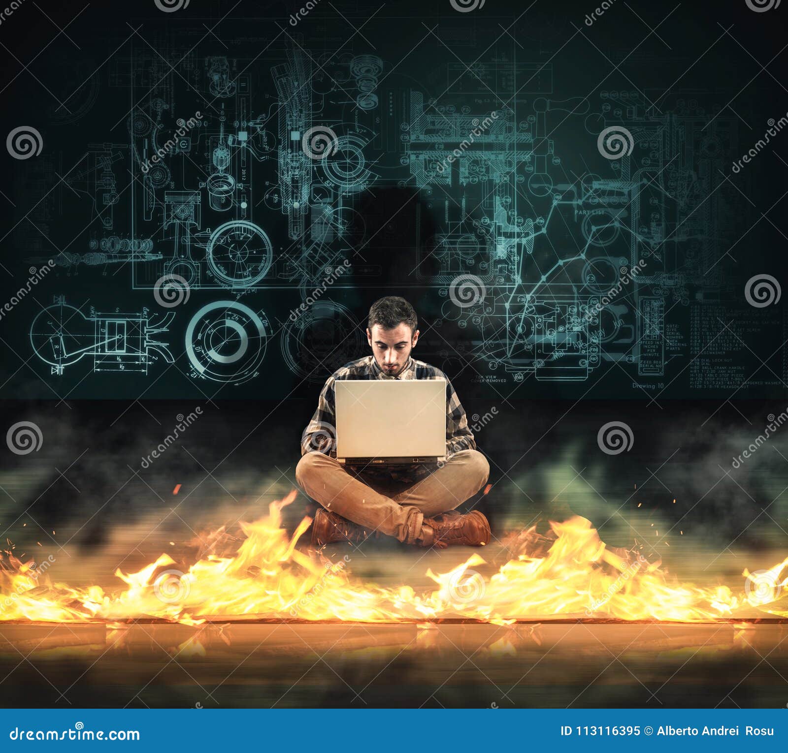 firewall protection. man working on laptop in front of a firewall.