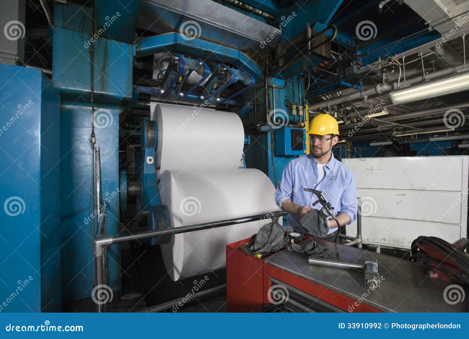 Man Working in Newspaper Factory Stock Photo Image of indoors