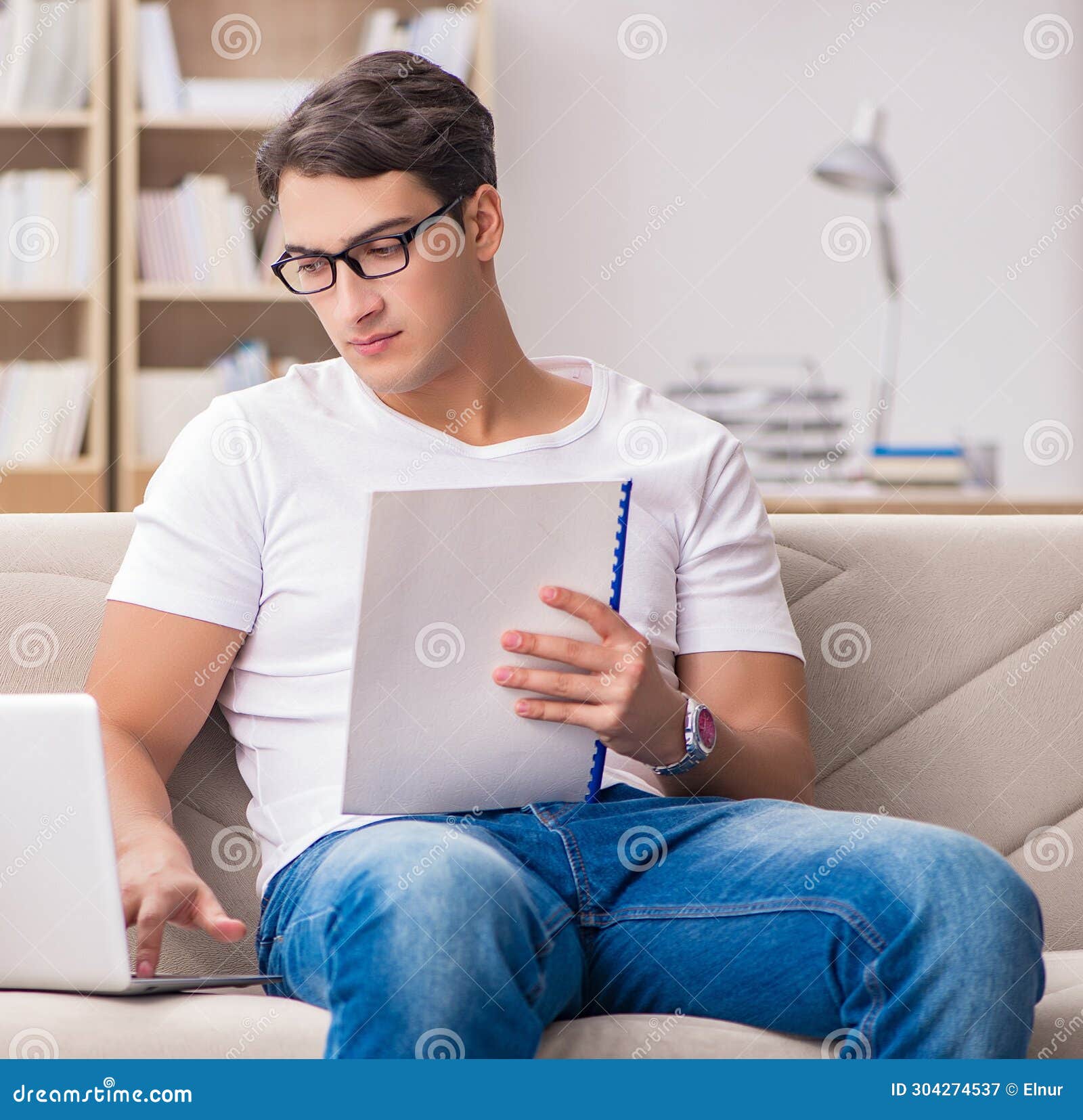 Man Working Sitting in Couch Sofa Stock Image Image of dictionary 304274537