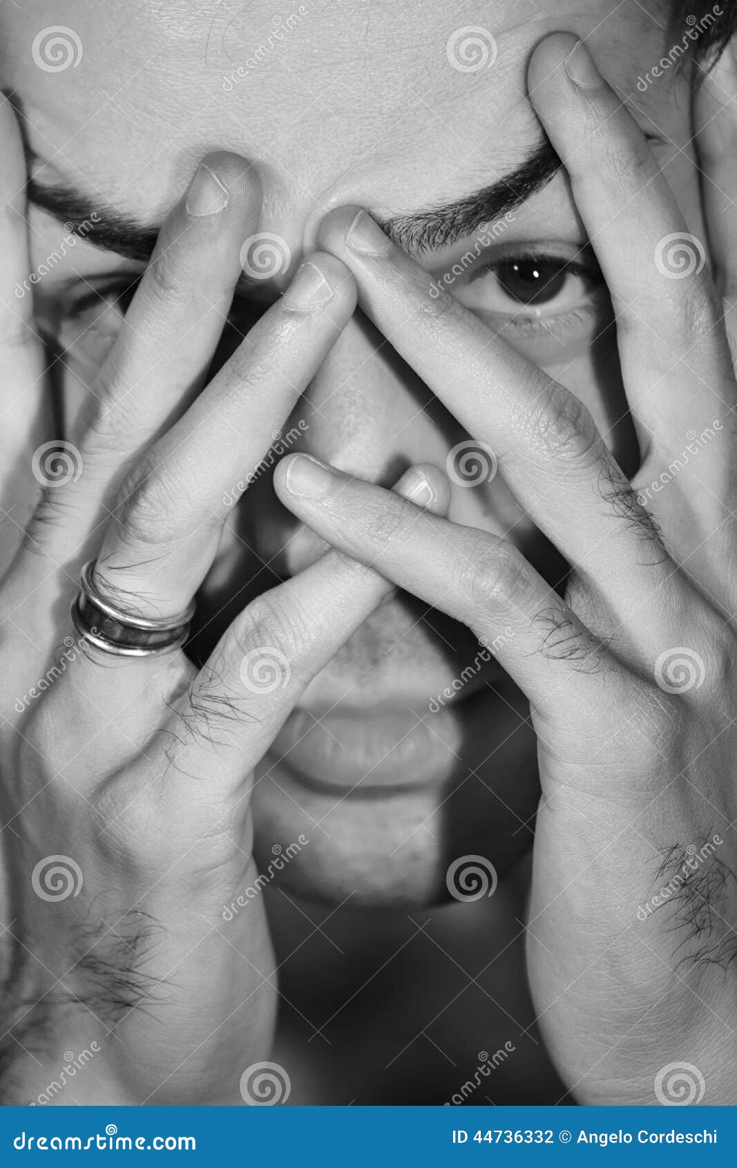man worried, stressed hides face. shame and fear c