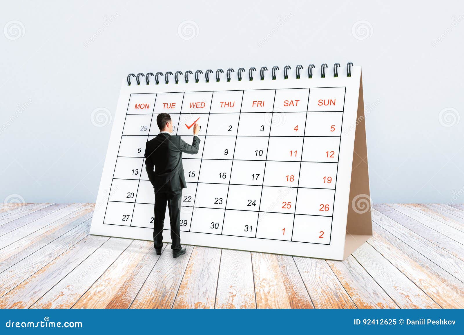 Man writing in calendar stock image. Image of april, business - 92412625