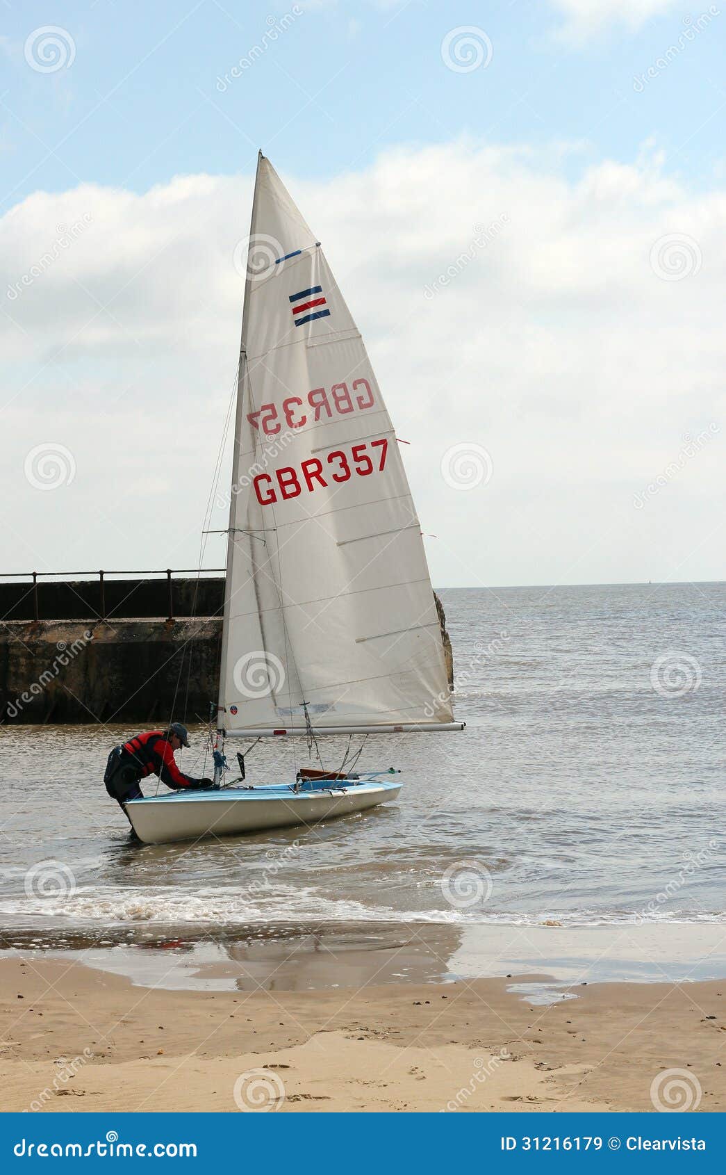 man with a yacht or sailing boat. editorial stock image