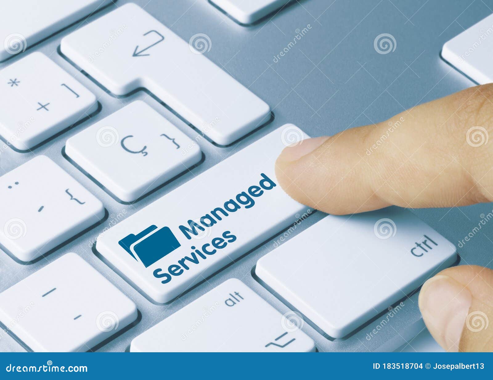 managed services - inscription on blue keyboard key