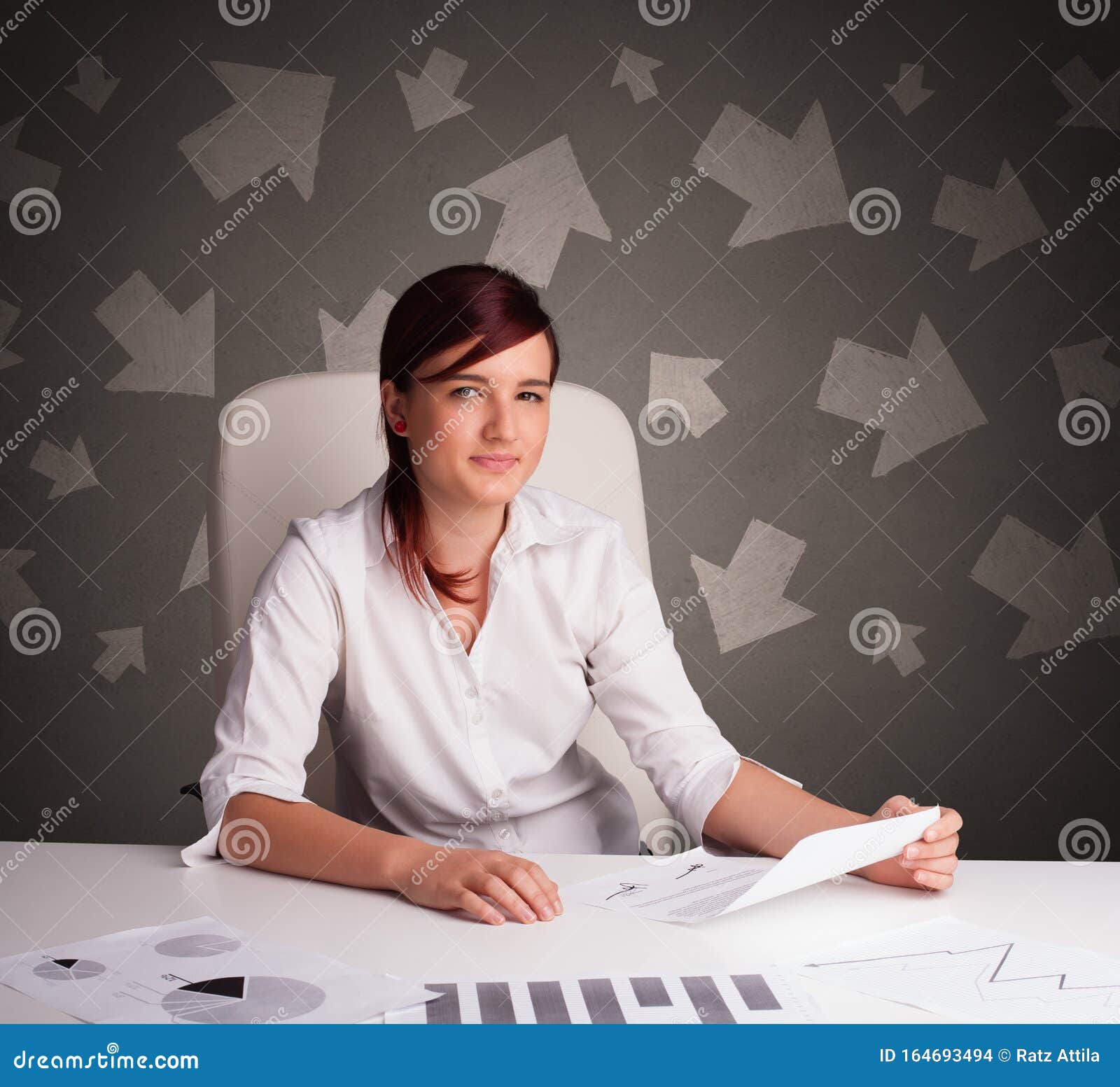Manager in Front of the Office Desk with Direction Concept Stock Photo