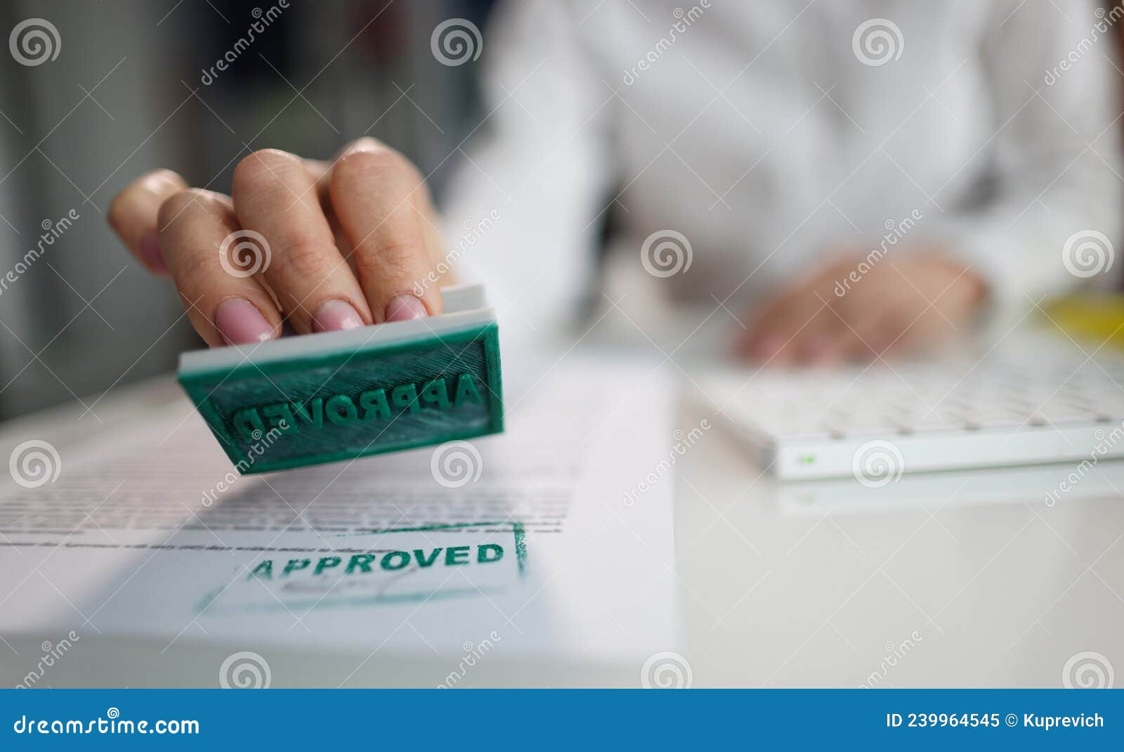 Manager Hand Putting Stamp Approved on Document in Office Closeup Stock