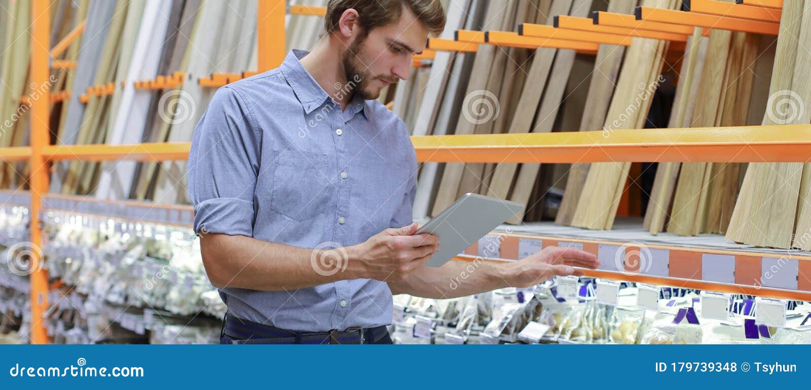 manager use his tablet for online checking products available