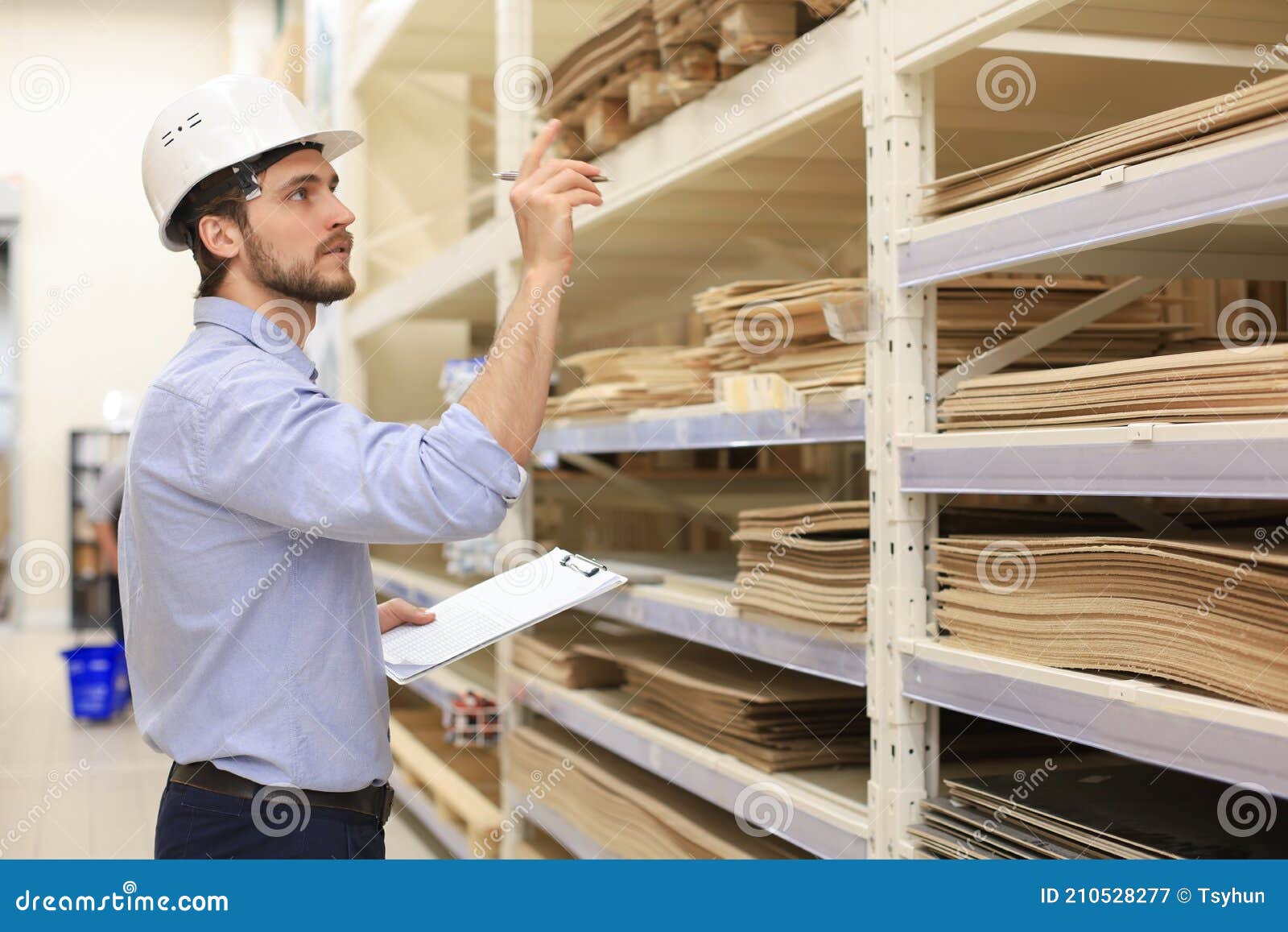 manager use his tablet for online checking products available