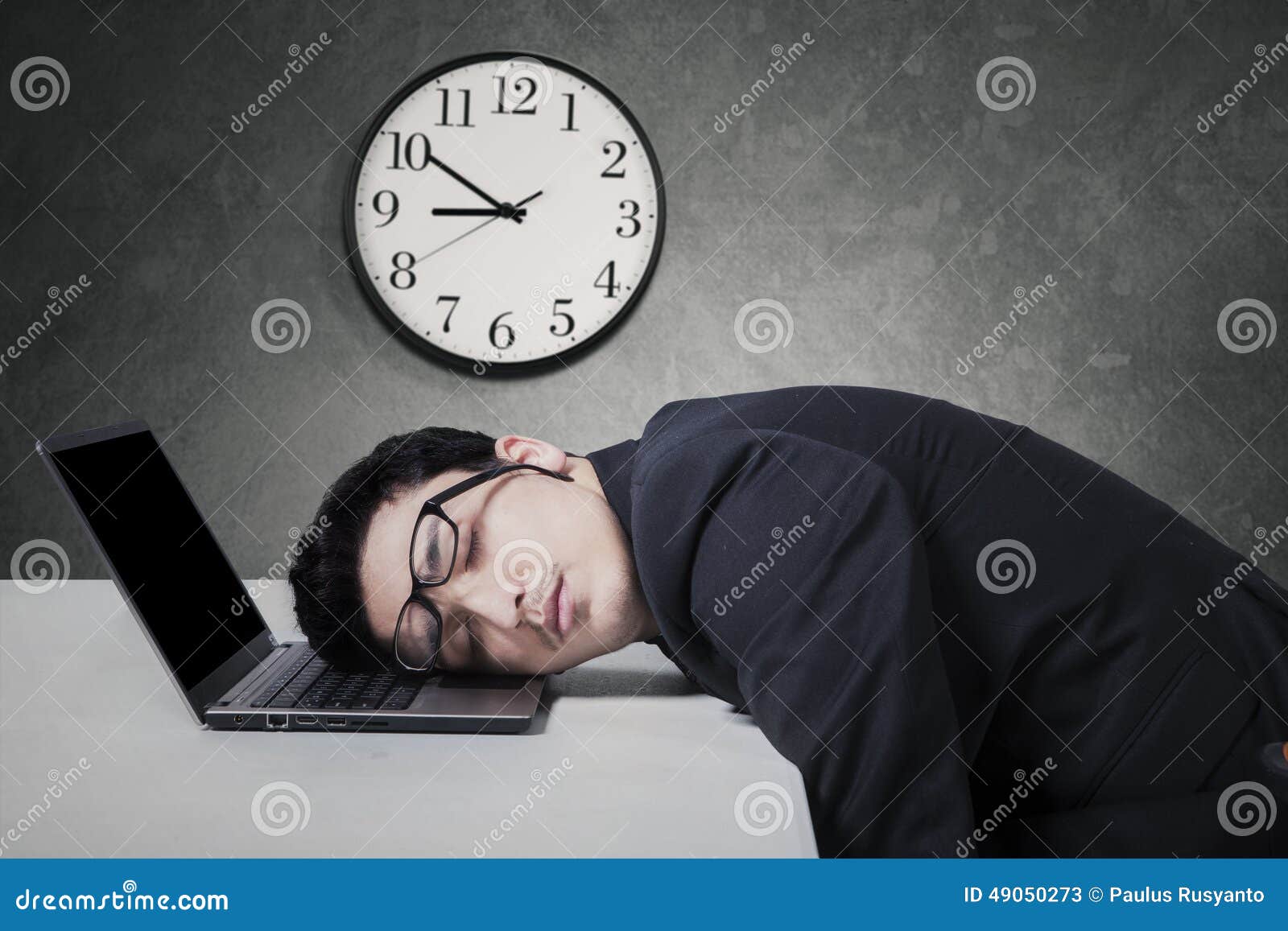 manager work overtime and sleep on laptop