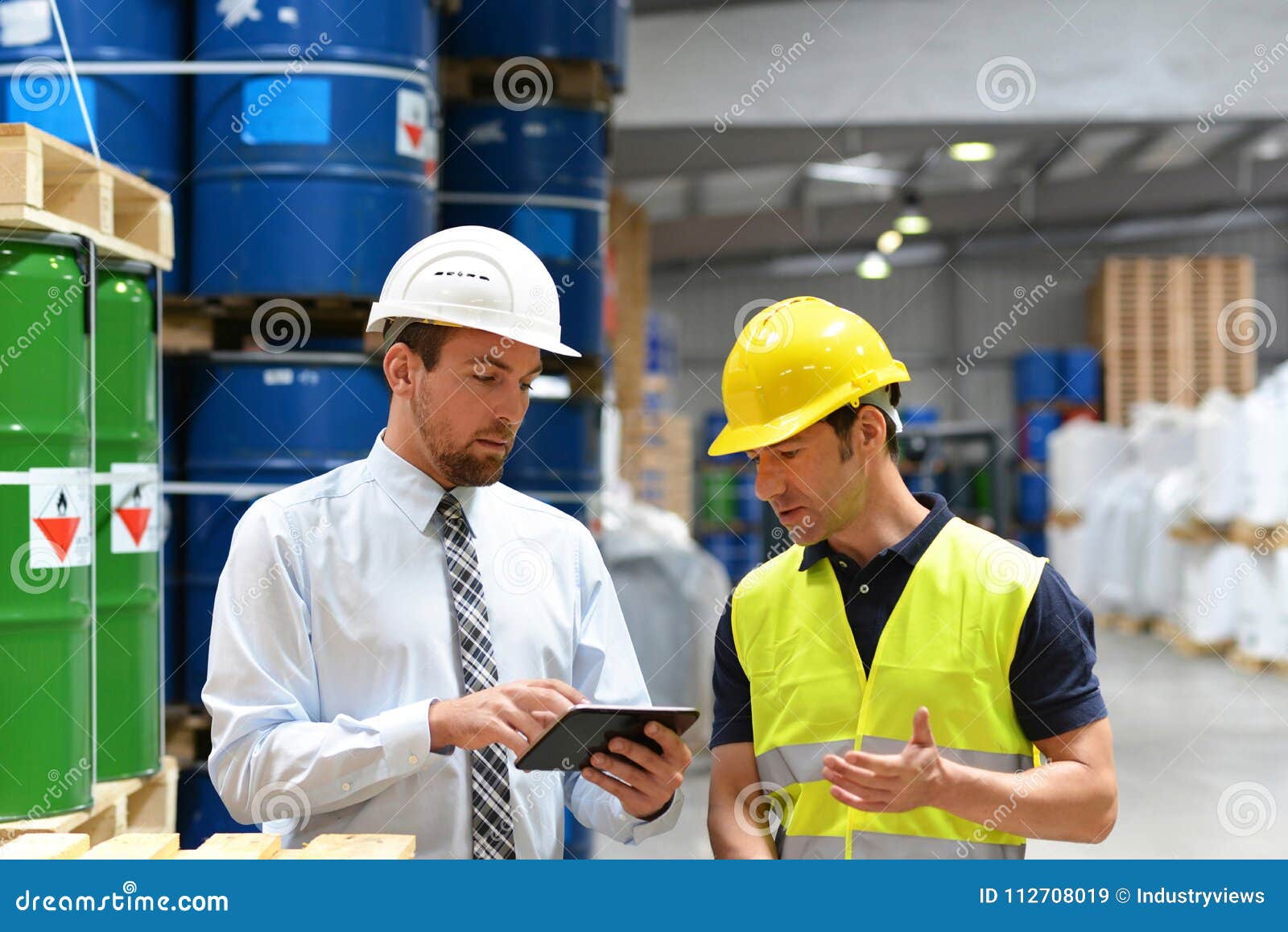 managers and workers in the logistics industry talk about working with chemicals in the warehouse