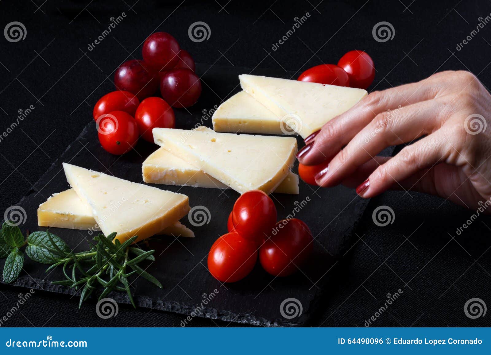 Manchego Cheese with Grapes, Mint and Rosemary Stock Photo Image of calcium, flavor 64490096