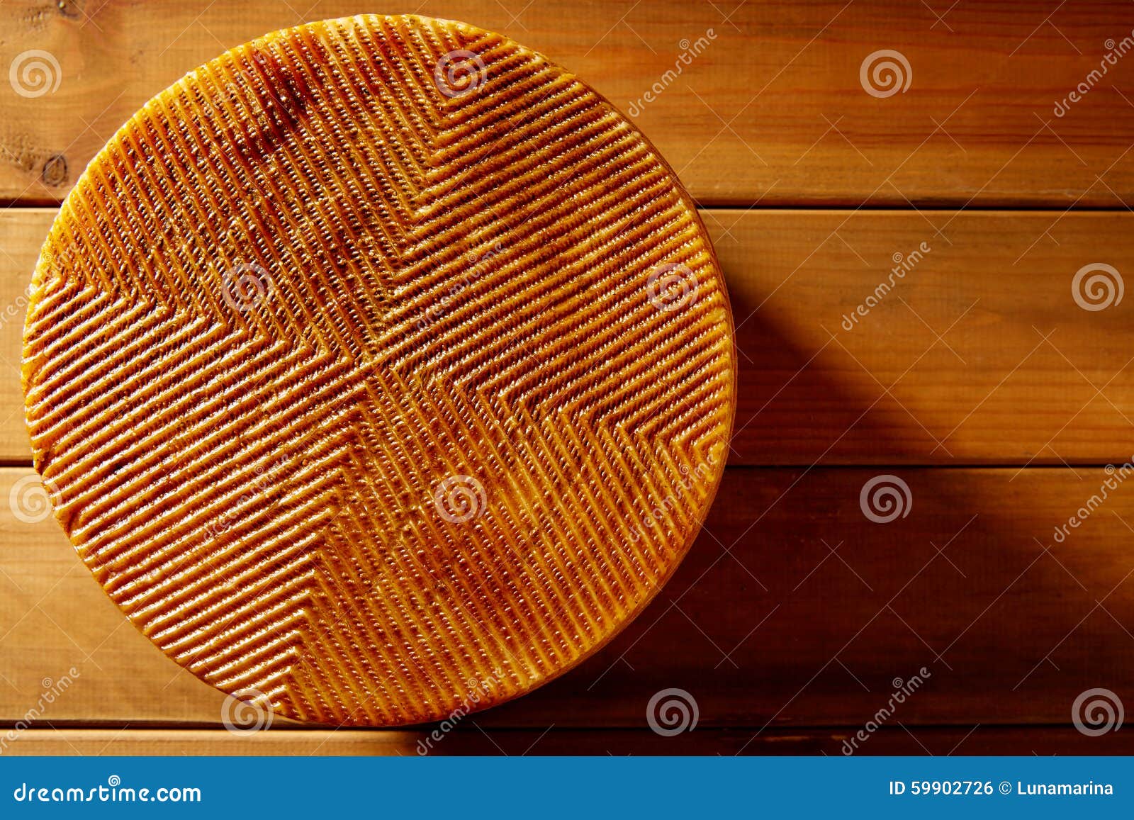 manchego cheese from spain in wooden table