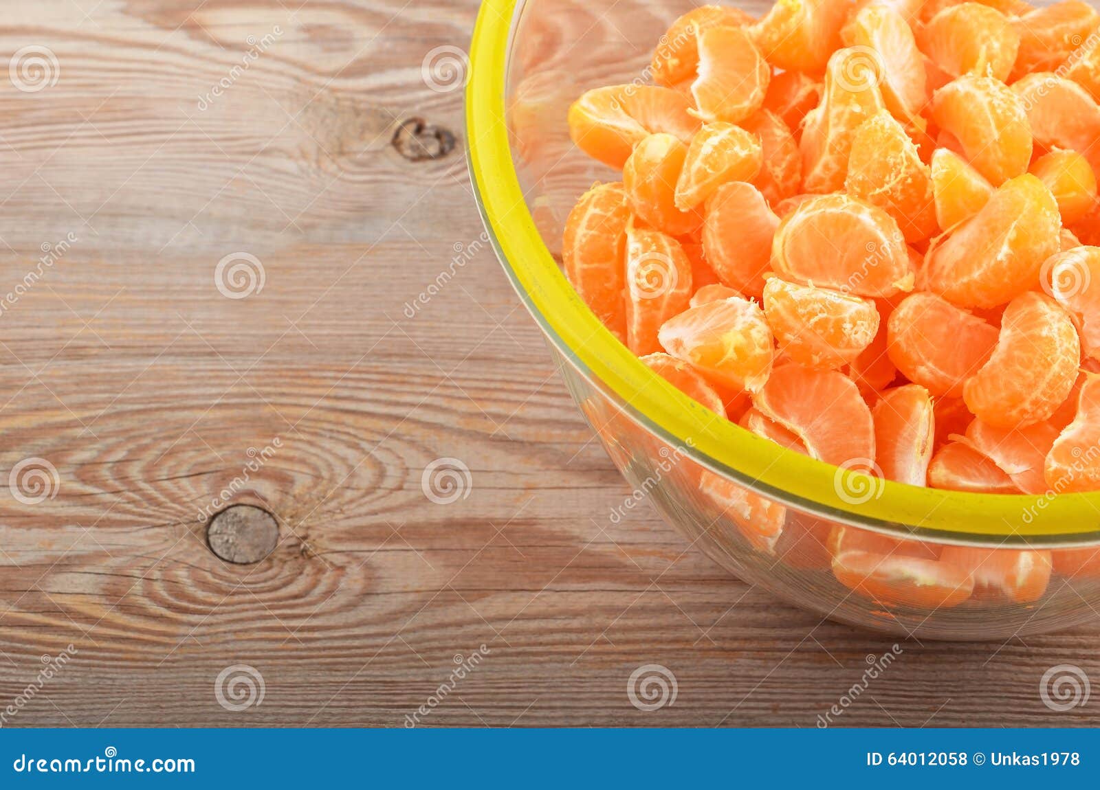 Mandarin in glass bowl stock photo. Image of organic 64012058