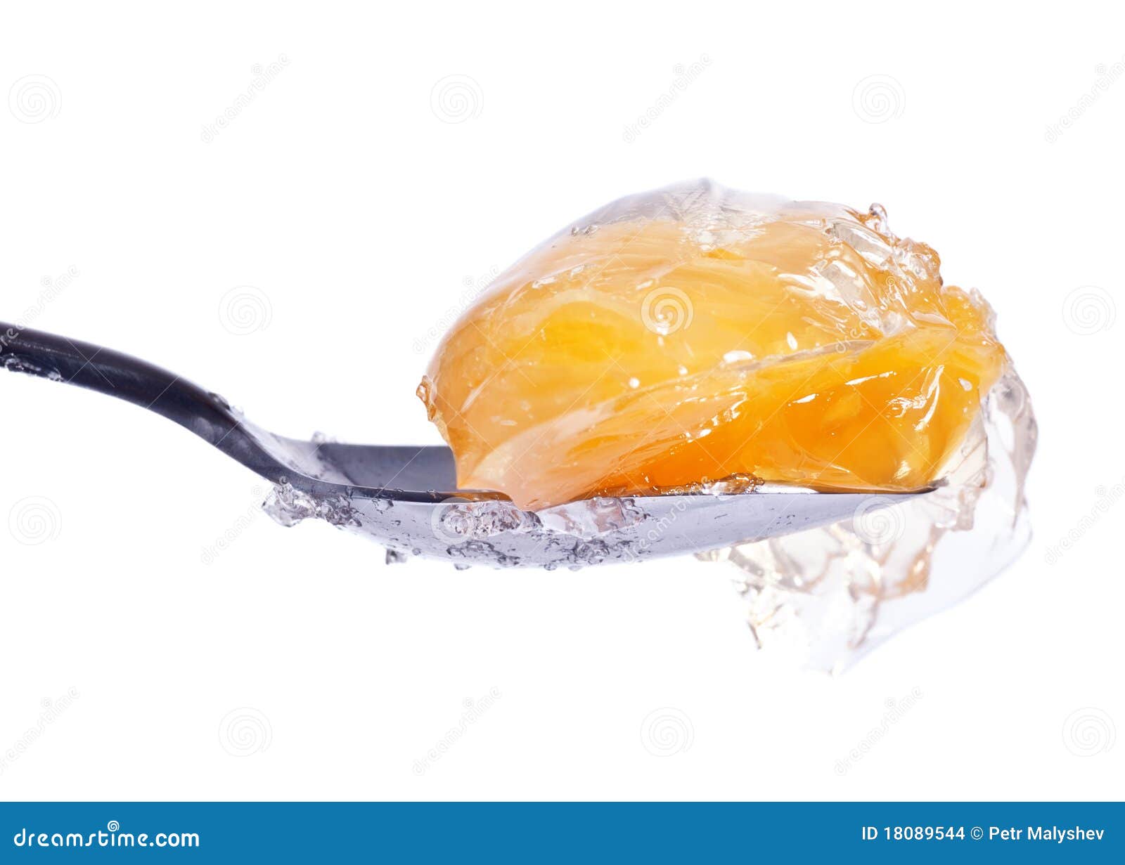 Mandarin in jelly on spoon stock photo. Image of utensil 18089544