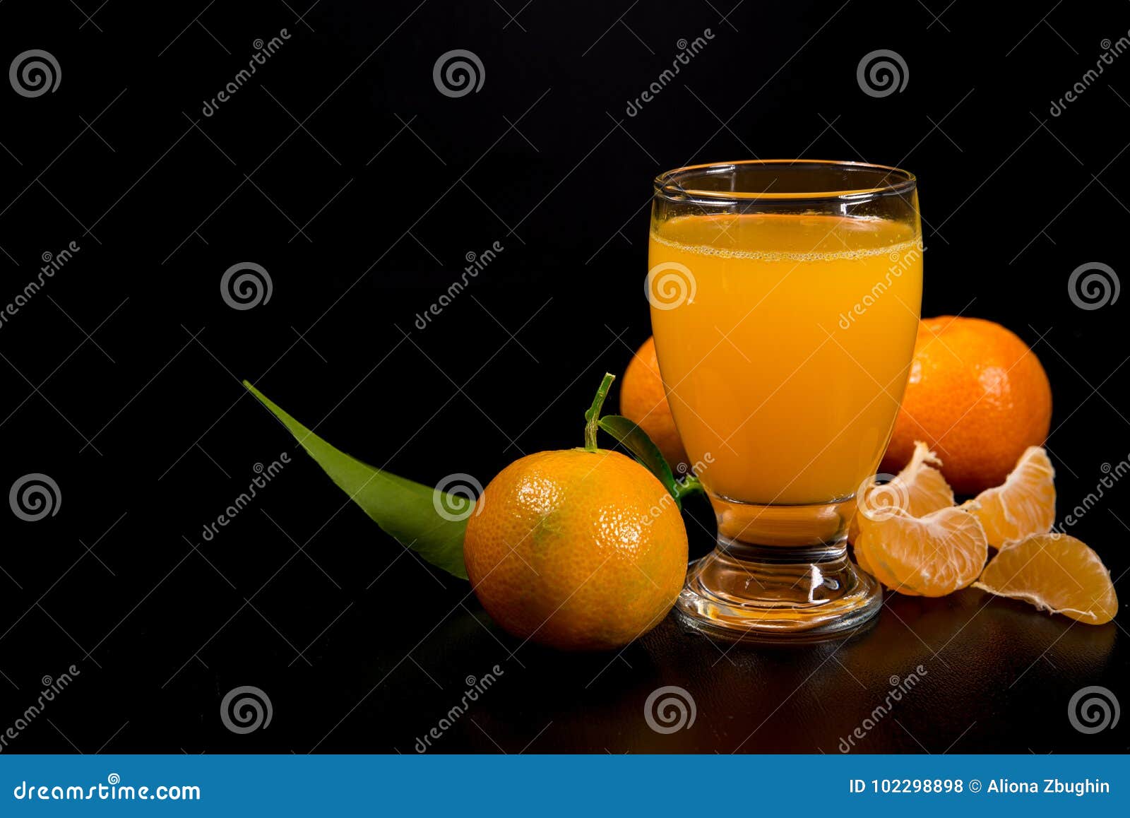 Mandarin Juice on Black Background Stock Photo - Image of leaf, juice ...