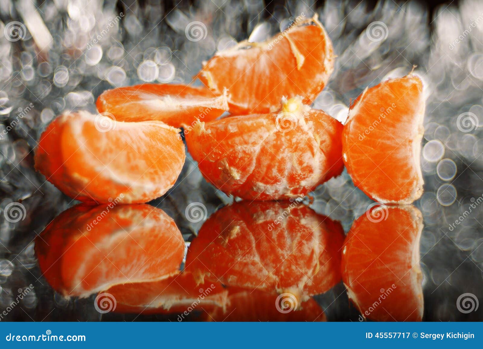 Mandarin Oranges and Cloves on Blurred Background Freshness Stock Image