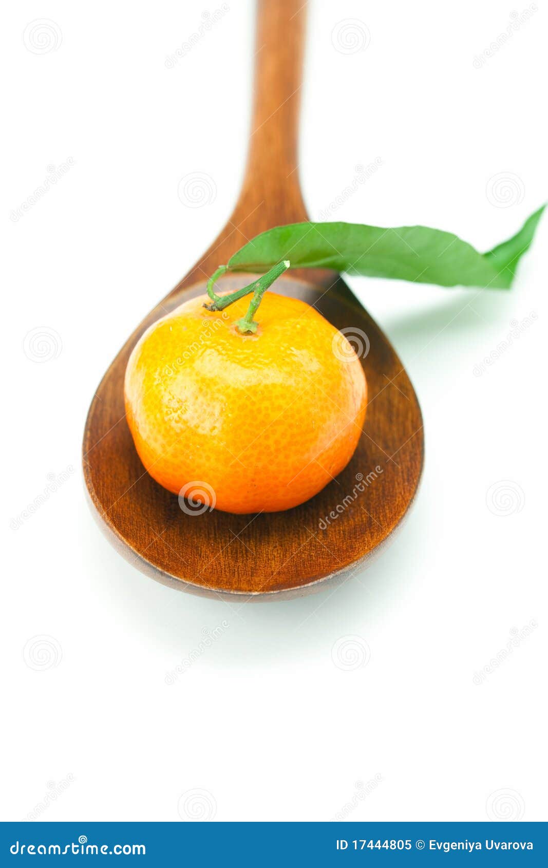 Mandarin on a Wooden Spoon Isolated on White Stock Image Image of
