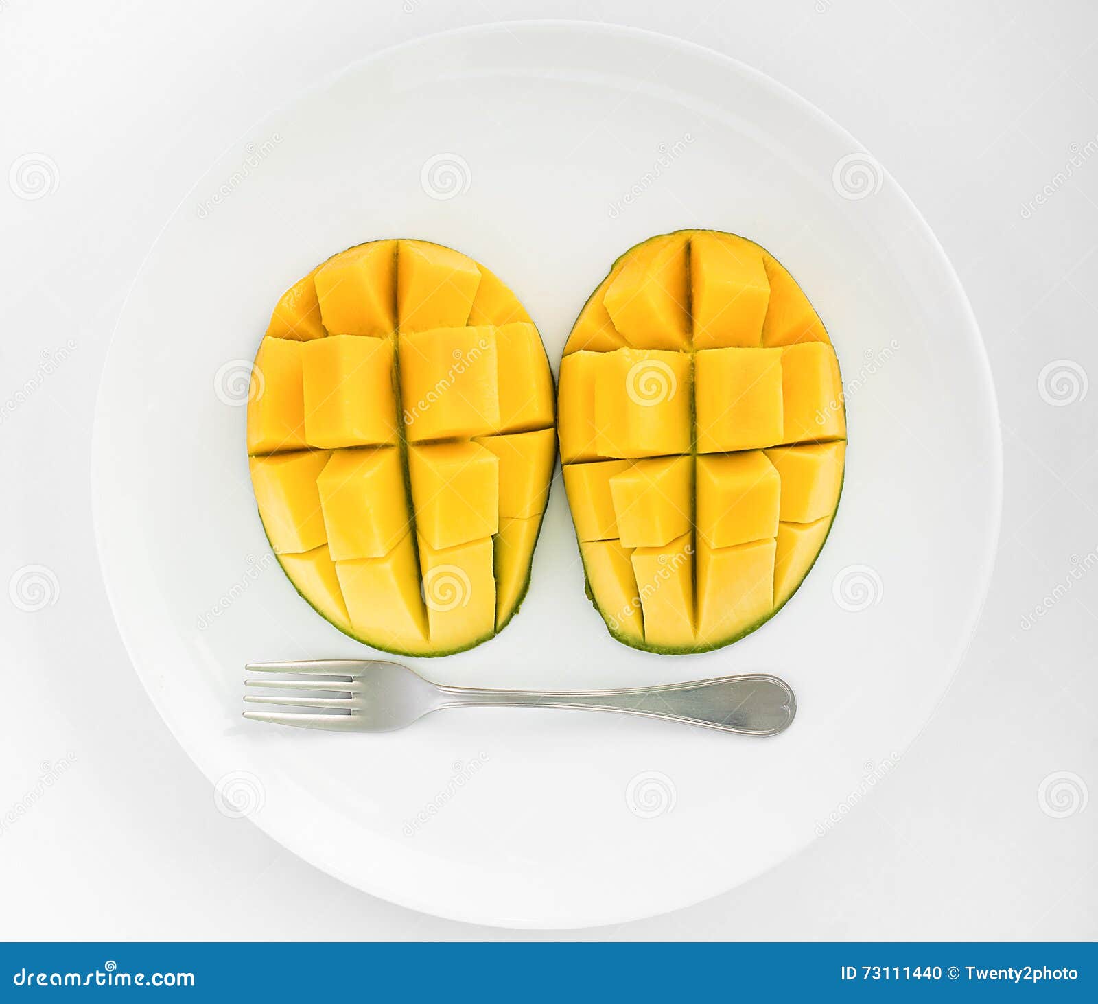 Mango face on a plate. stock photo. Image of tasty, fruit 73111440