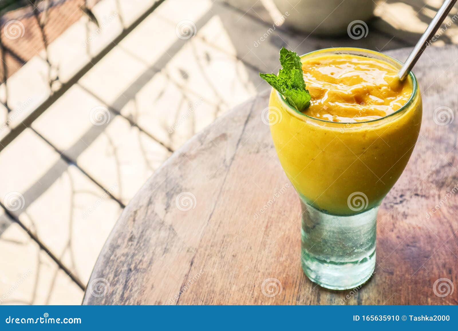 Mango juice in glass stock photo. Image of glass, exotic 165635910