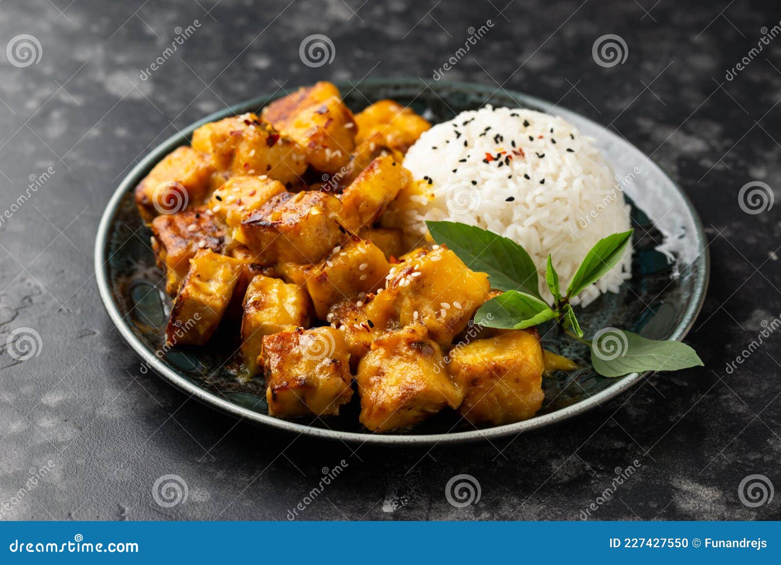 Mango Sticky Tofu with Jasmine Rice and Thai Basil Stock Photo Image