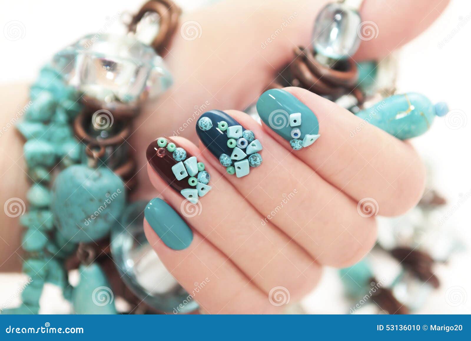 manicure with beads and turquoise.