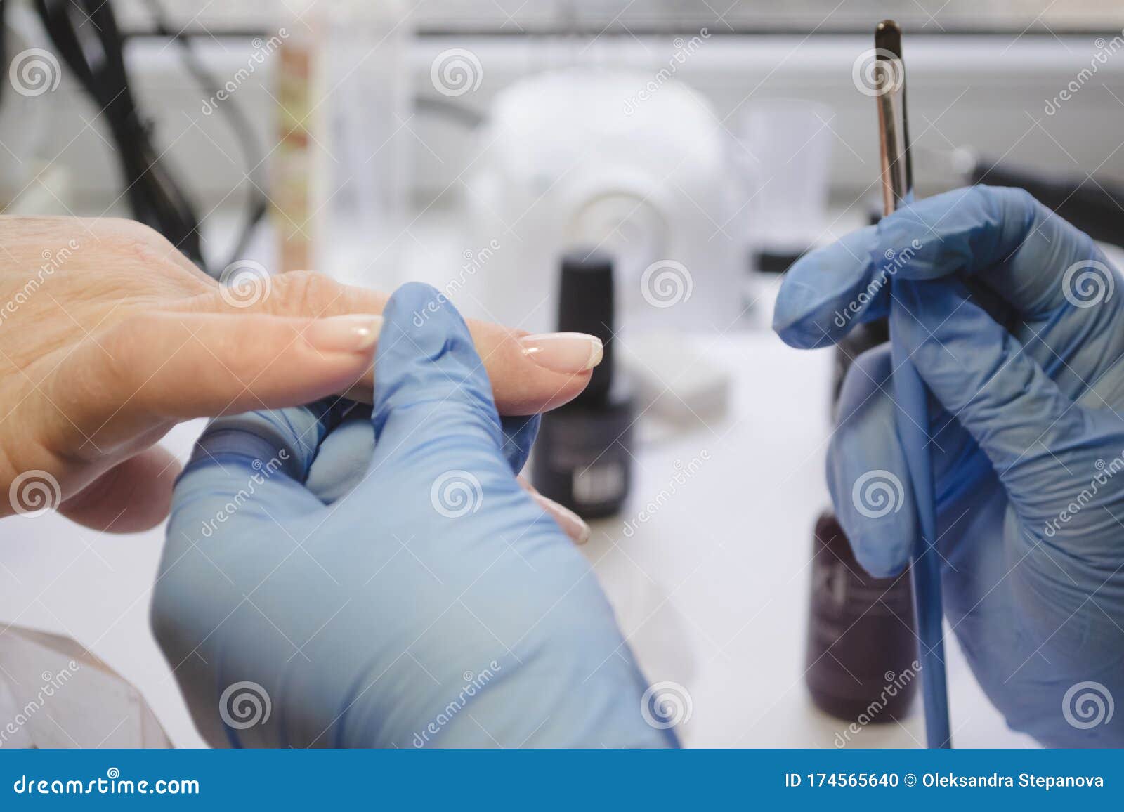 Manicure Beauty Salon Master In Blue Rubber Gloves Applies ...