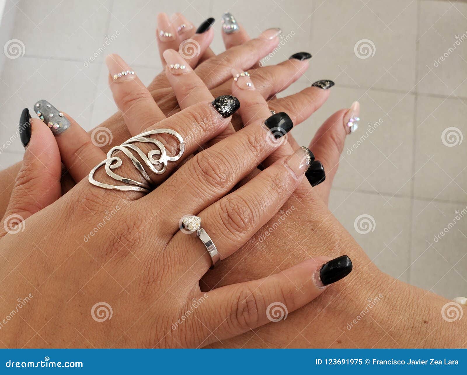hands of two women together as a token of love