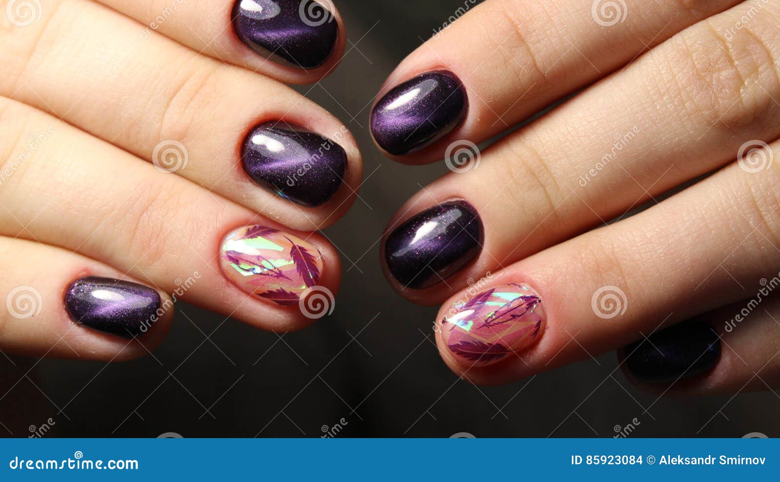 Manicure Nail Design Cat`s Eye, Feathers on Broken Glass Stock Photo ...