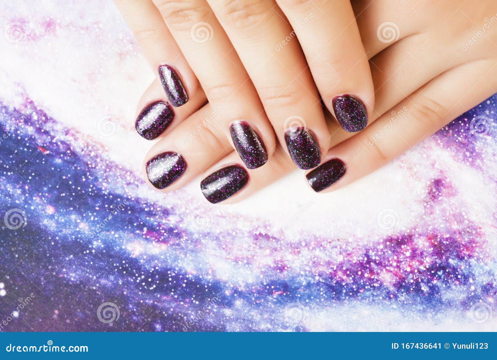 Manicure Stylish Concept: Woman Fingers with Nails Purple Glitter on ...