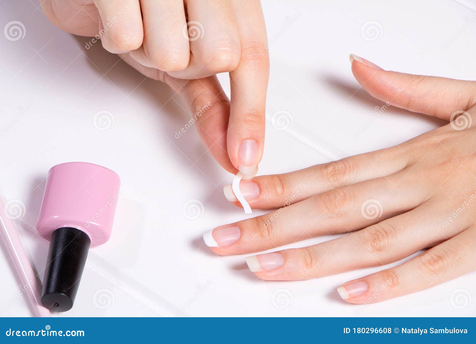 Manicure. a Woman Glues Stickers on Her Nails for French Manicure. the Girl Applies Nail Polish. Nail Care Stock Photo - Image of apply, beauty: 180296608 Manicure. a Woman Glues Stickers on Her Nails for French Manicure. the Girl Applies Nail Polish. Nail Care Stock Photo - Image of apply, beauty: 180296608
