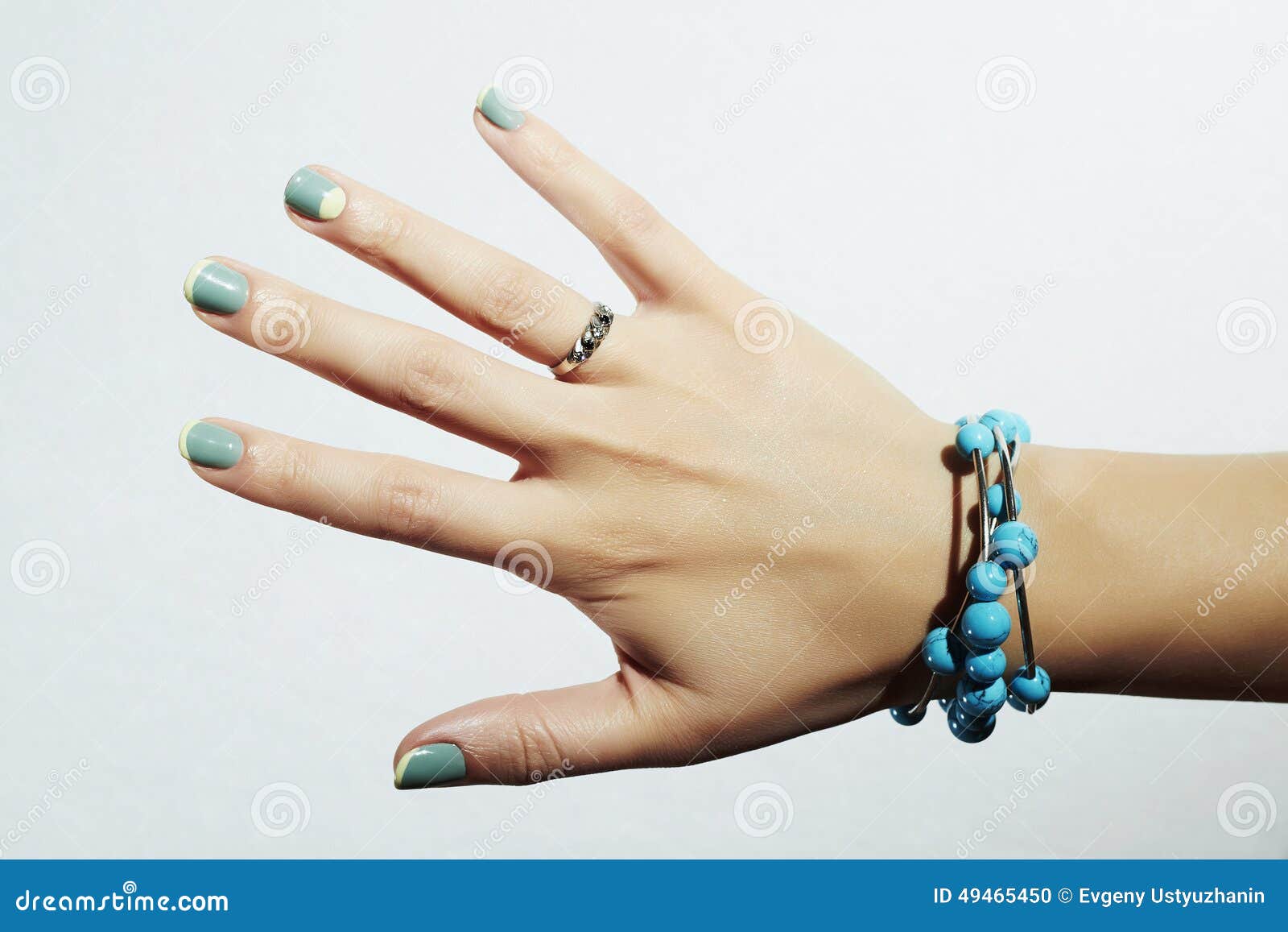 manicure.woman hand in beauty salon.french shellac polish nail 