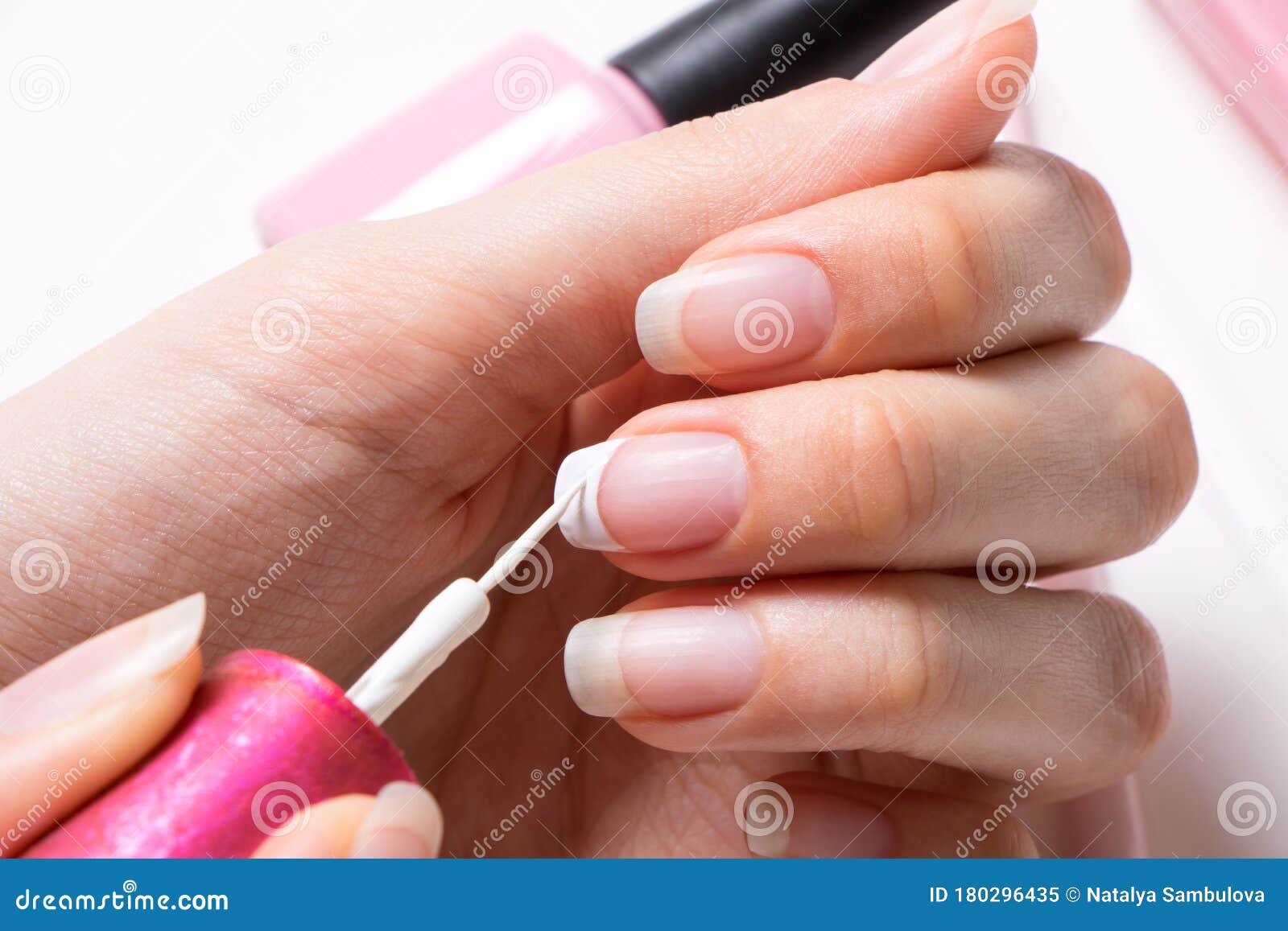 Manicure. a Woman Paints Her Nails. the Girl Applies Nail Polish. French.  Nail Salon, Procedure, SPA. Home Nail Care Stock Photo - Image of body,  elegance: 181801522