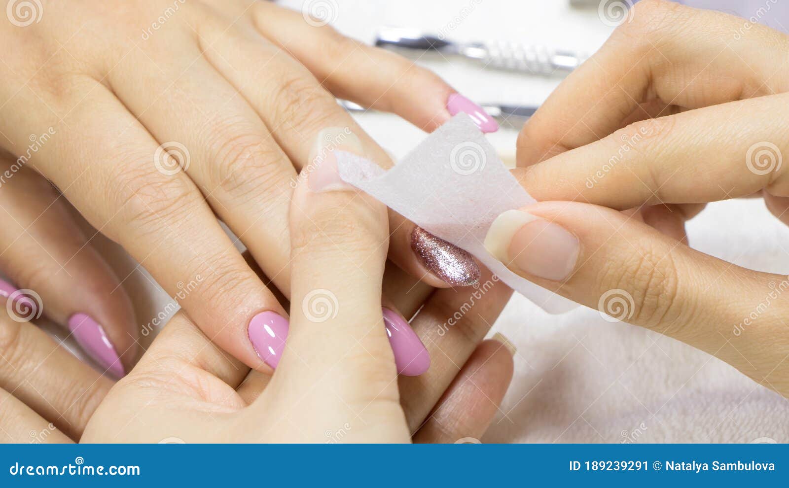 Manicure. Woman Removing Glitter Nail Polish on White Towel. Care by Nails - Nail Polish Removal Stock Image - Image of professional, relaxation: 189239291 Manicure. Woman Removing Glitter Nail Polish on White Towel. Care by Nails - Nail Polish Removal Stock Image - Image of professional, relaxation: 189239291