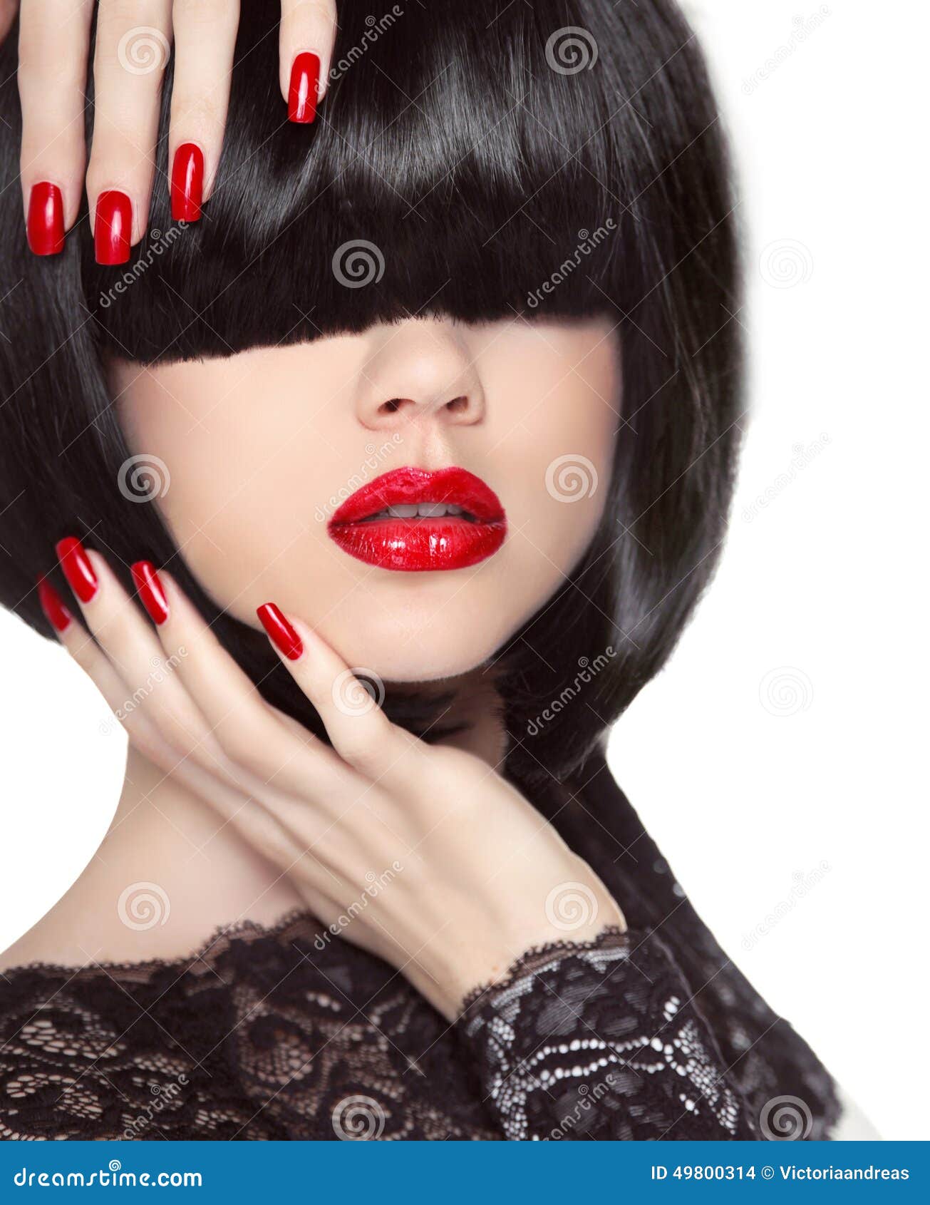 manicured nails. red lips. black bob hairstyle. brunette girl
