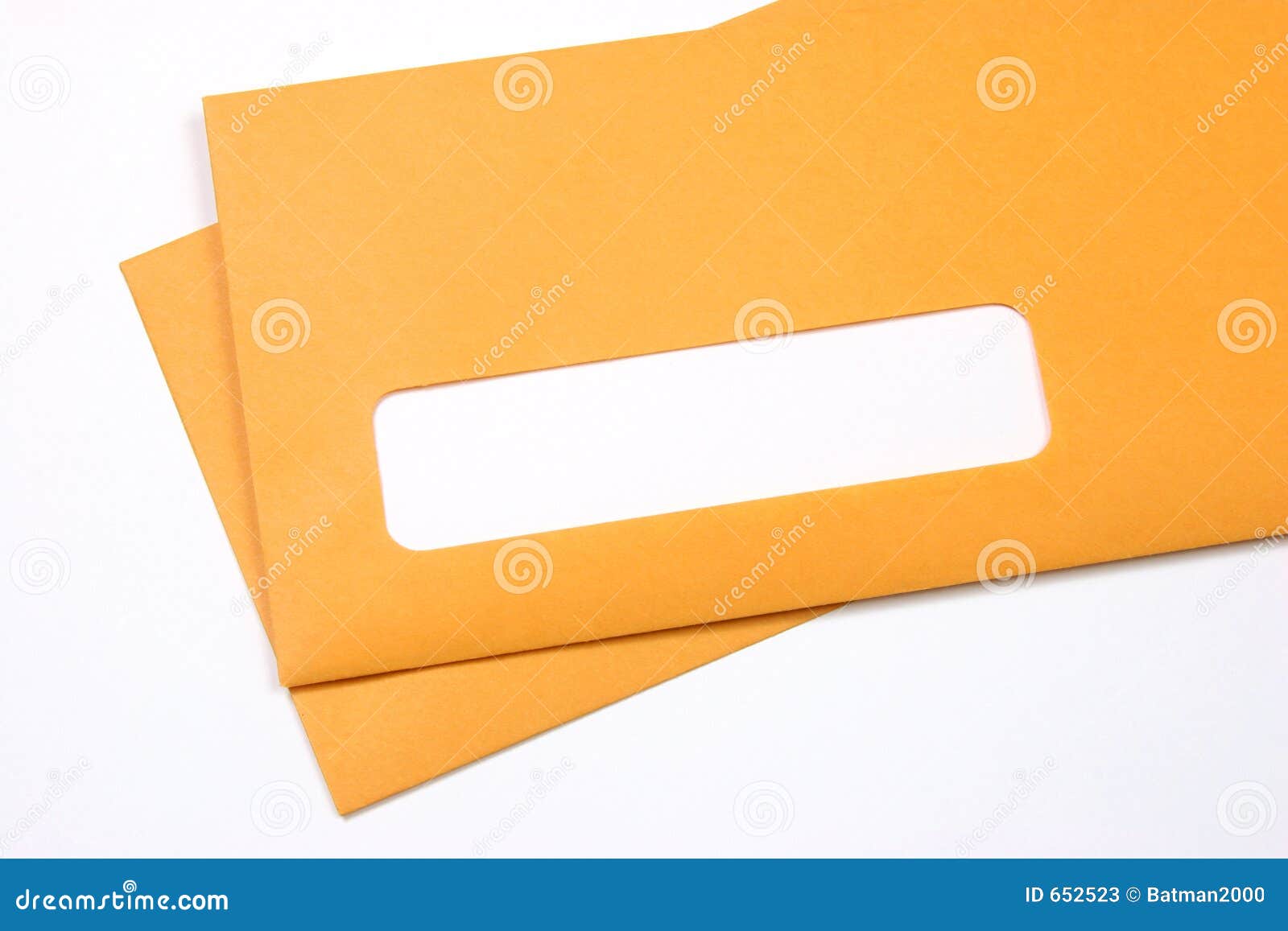 manila envelopes over white