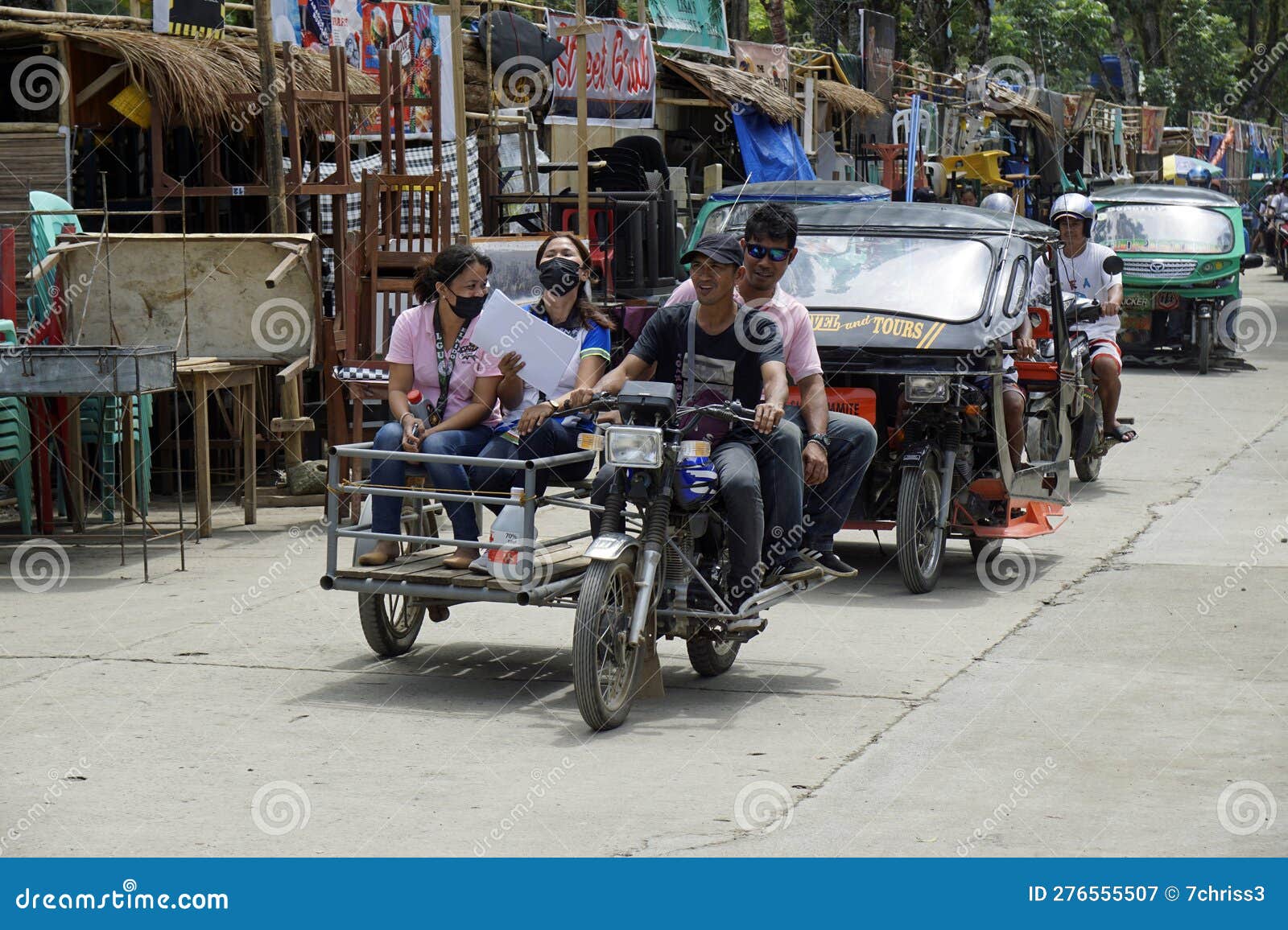 Manila, Philippines, Circa March 2023 Tricycle Traffic Editorial