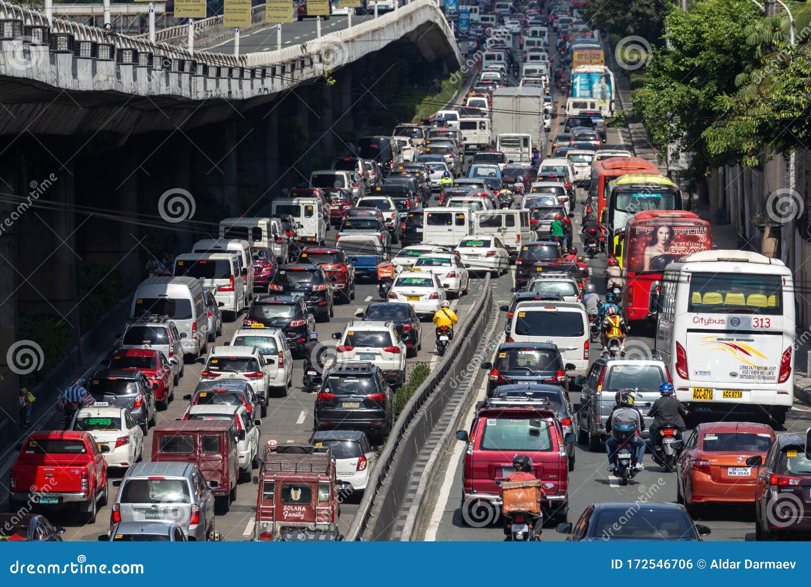 Traffic Jam With Many Cars And Buses On Dhaka City Street With Smoke traffic-jam-with-many-cars-and-buses-on-dhaka-city-street-with-smoke