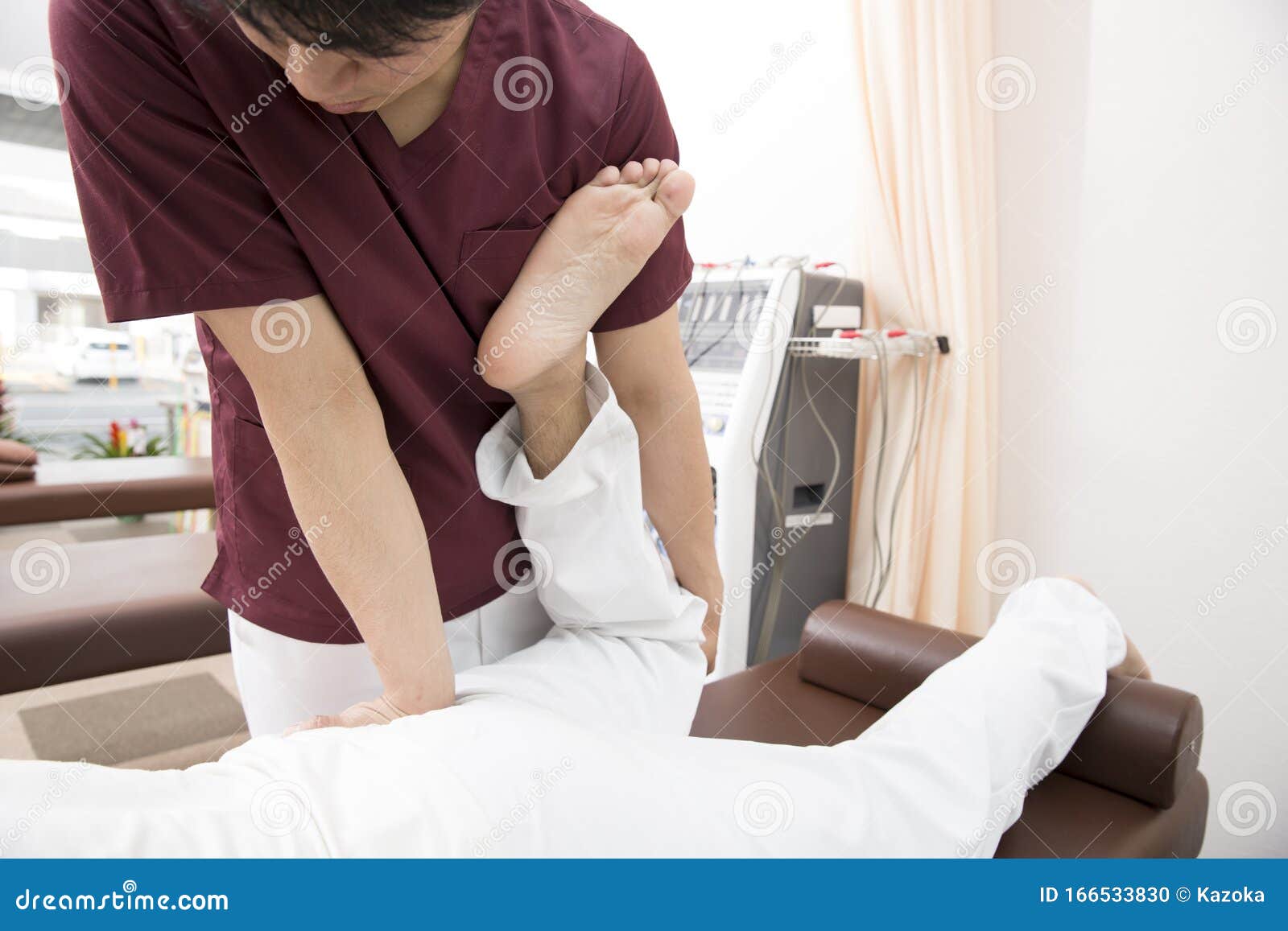 A Manipulator Performs a Treatment Stock Photo Image of therapeautics