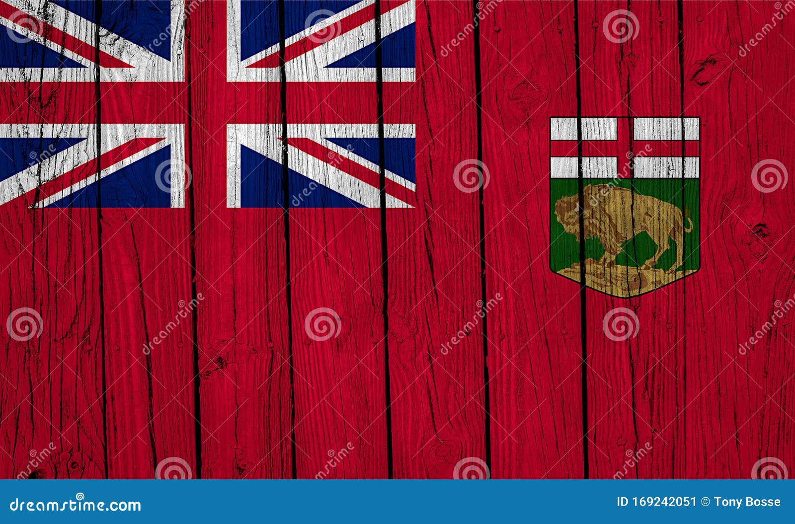 manitoba flag over wood planks