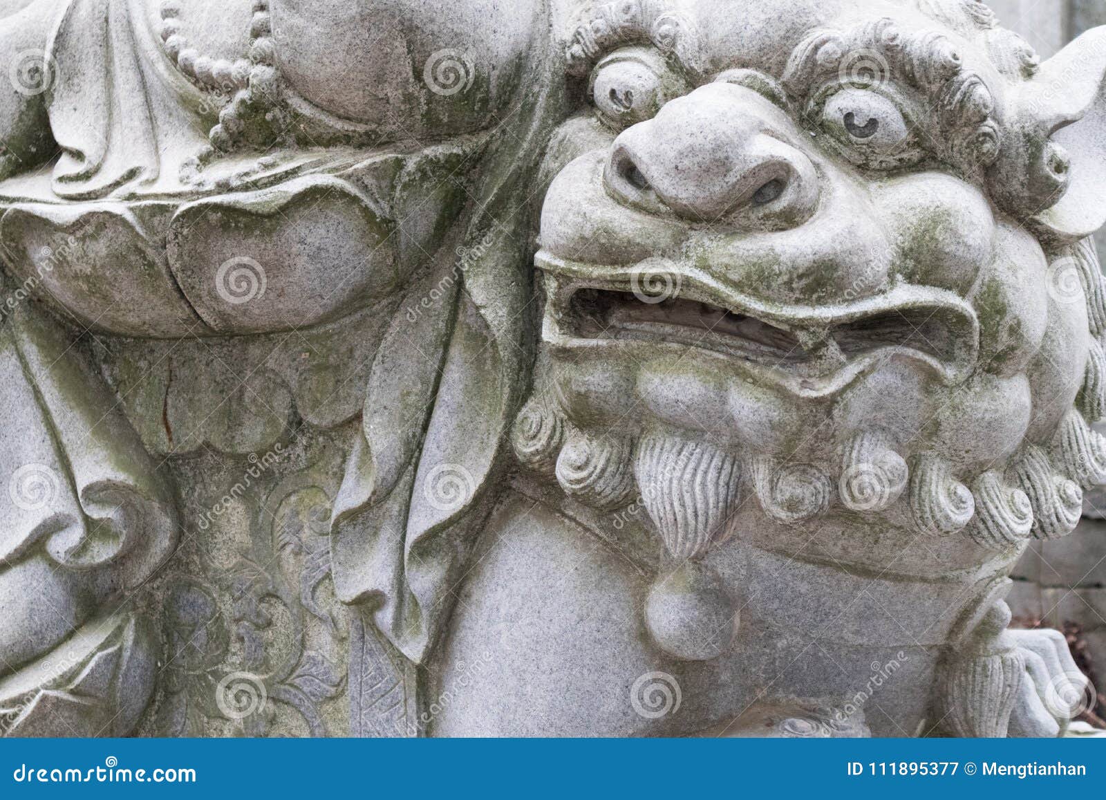green lion-stone statue