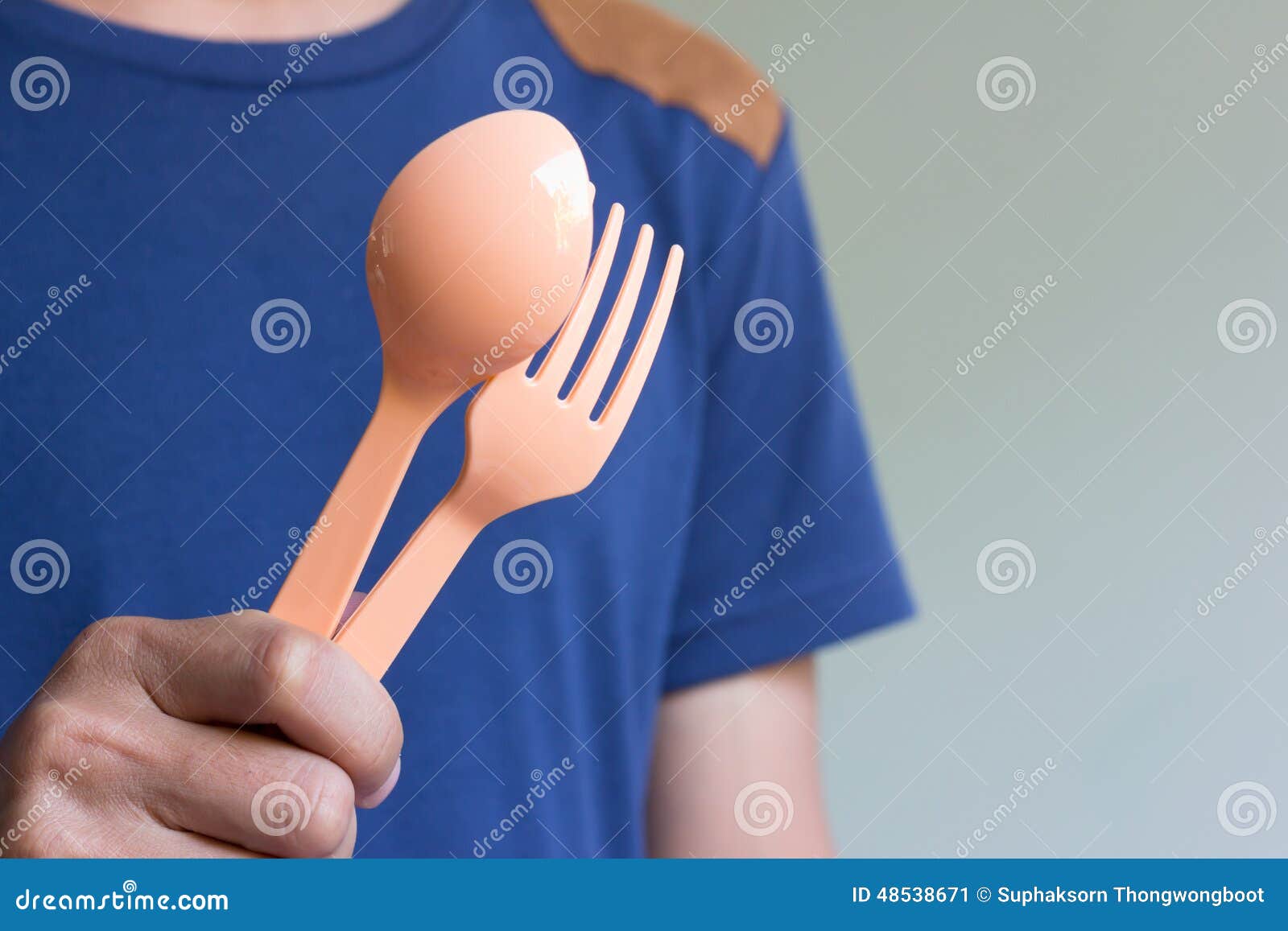 Mann Der Loffel Und Gabel Halt Stockbild Bild Von Loffel Mann 48538671