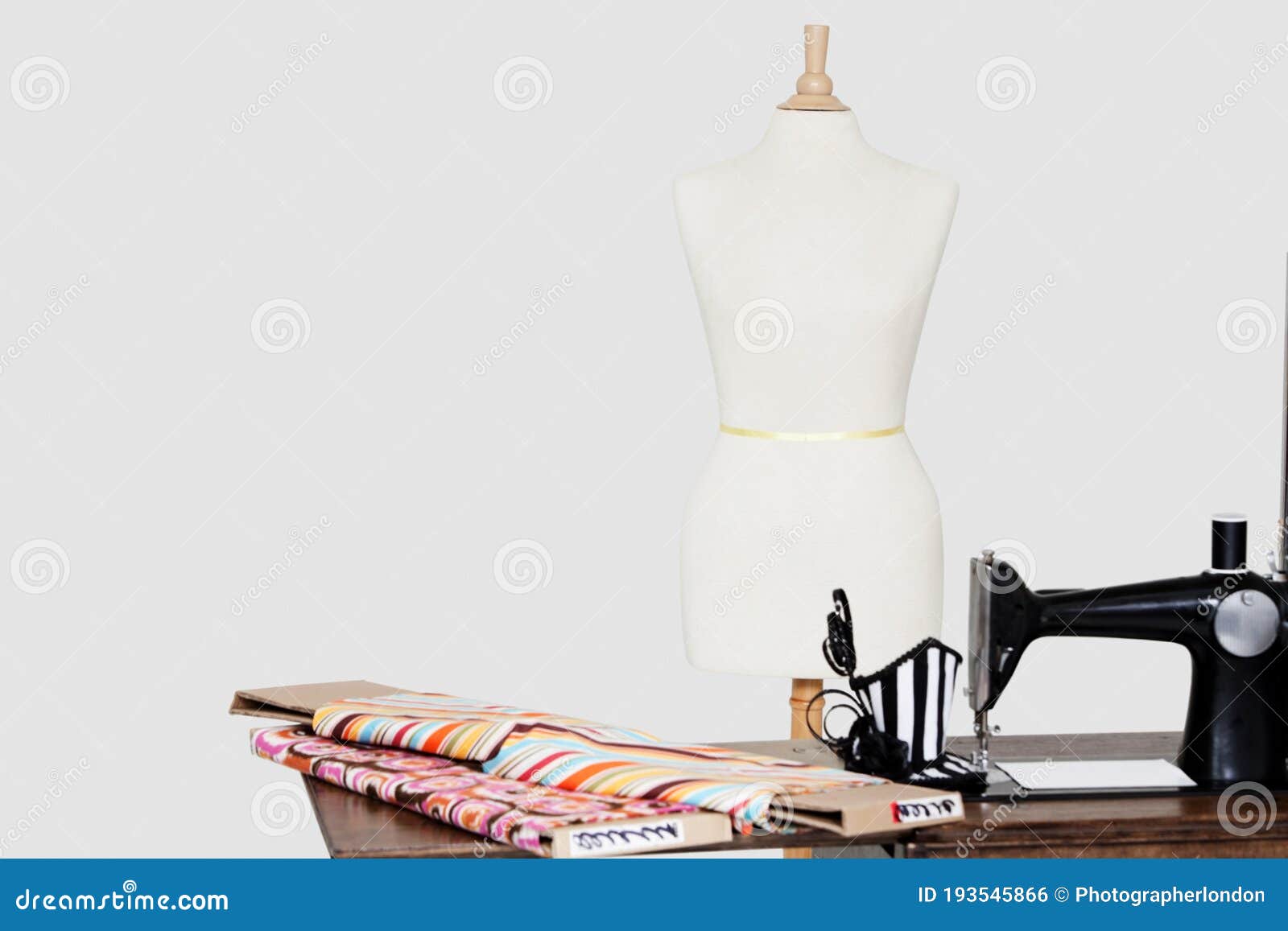 Mannequin with Tailor Sewing Machine and Fabric Stock Photo Image of