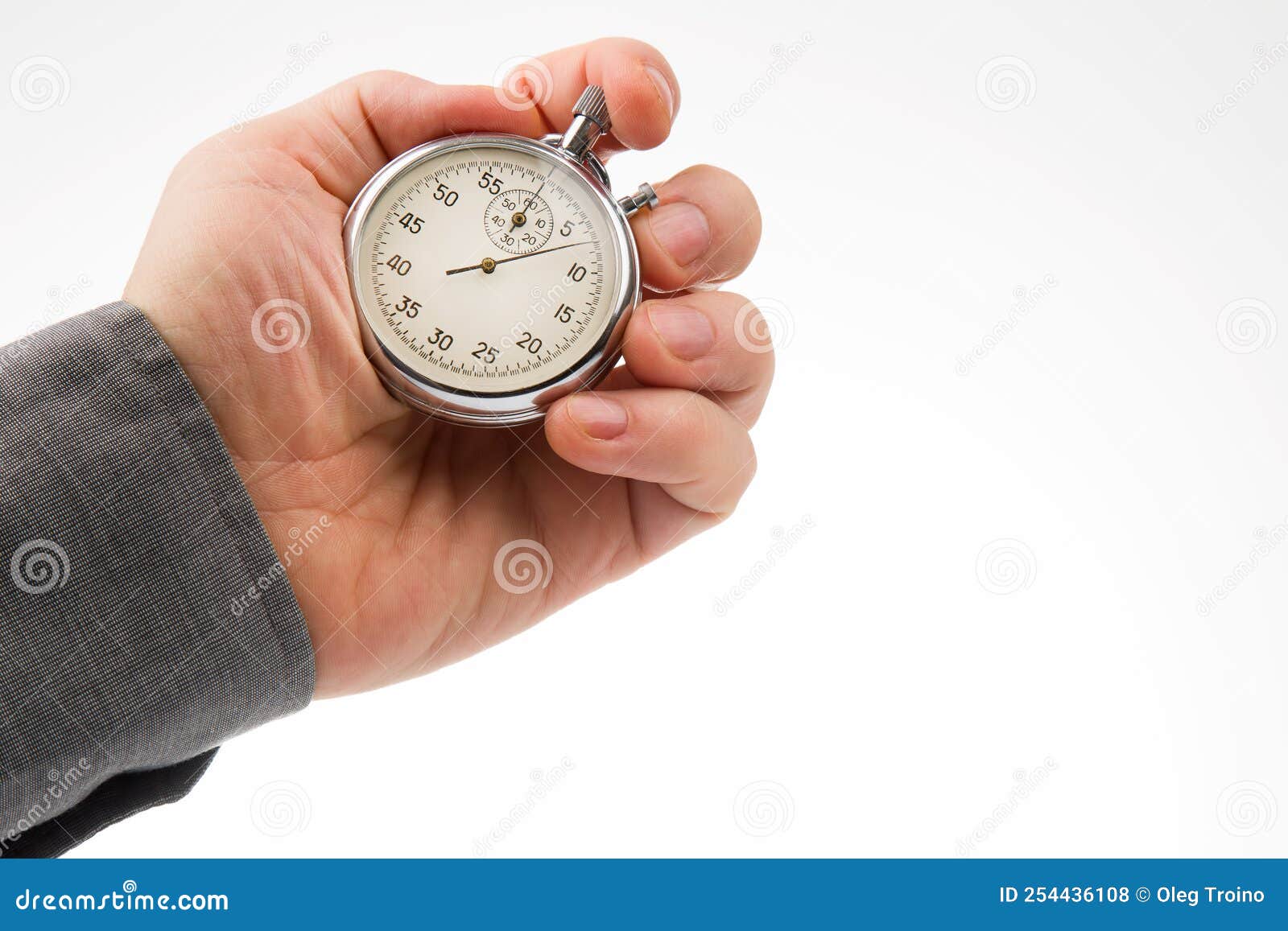 Mano Con Un Cronometro Analogico Su Fondo Bianco. Precisione Della