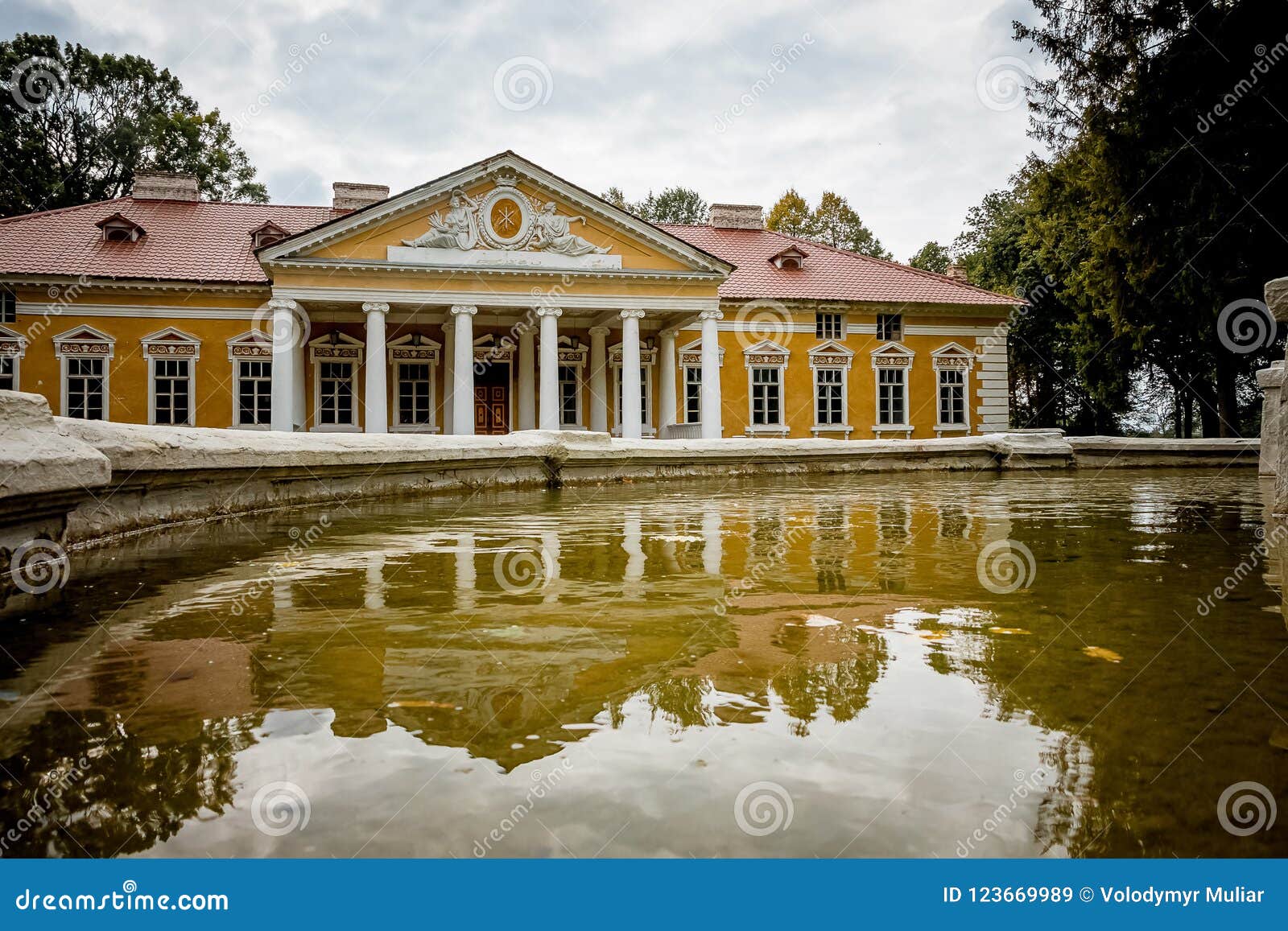 manor in the village samchiky starokostyantinivsky raion, ukraine. building in the style of classicism. reflection