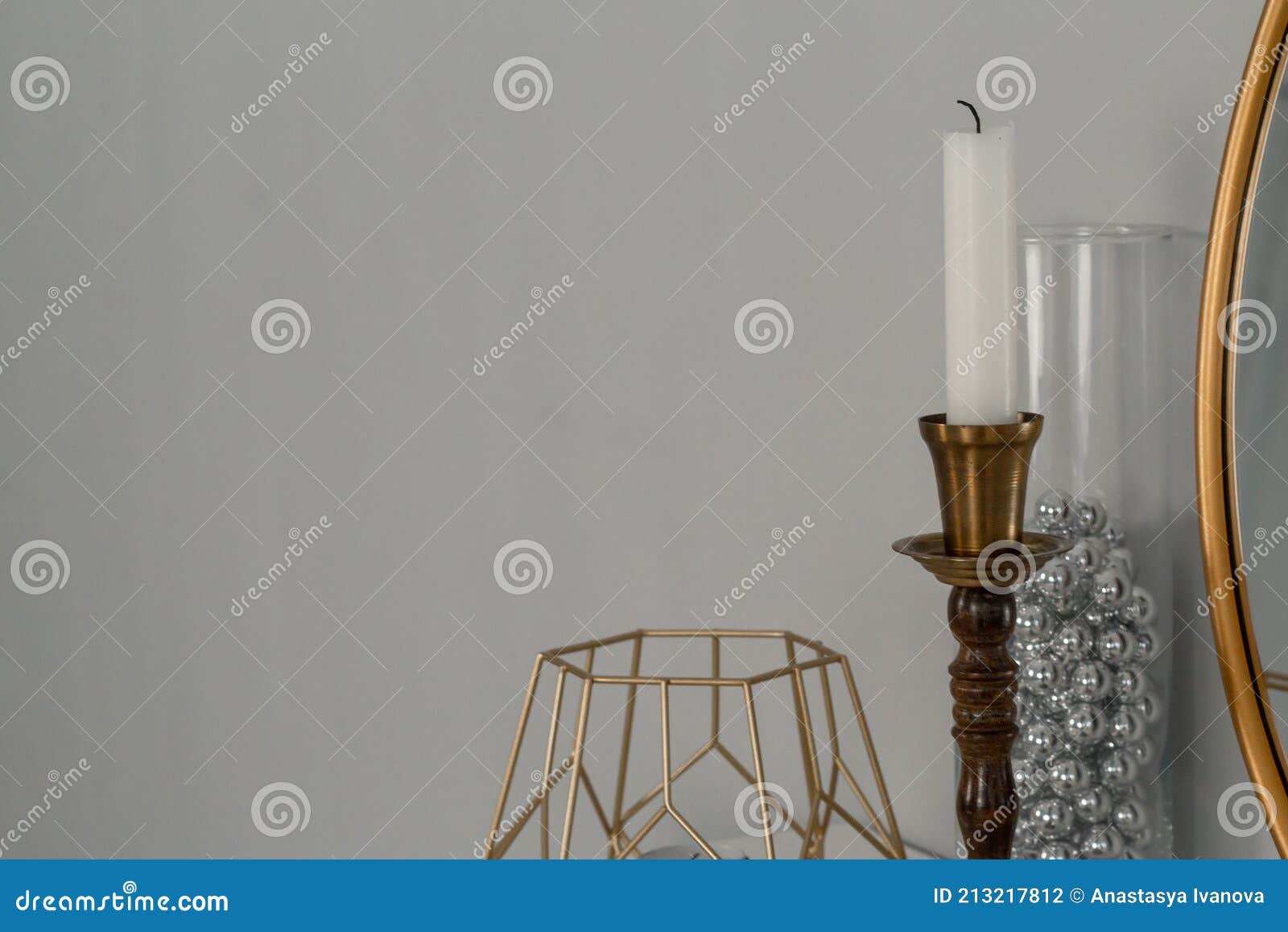 Mantelpiece with Stylish Decor. Candles in Gold Candlesticks Stock