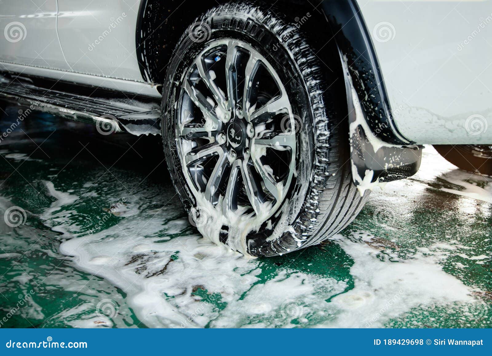 Manual Car Wash on Soap Process. Keep Clean for Driver and Passenger