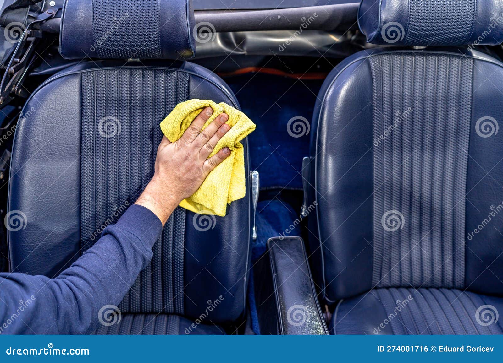 Manual Cleaning of the Leather in the Interior of the Car with a Micro