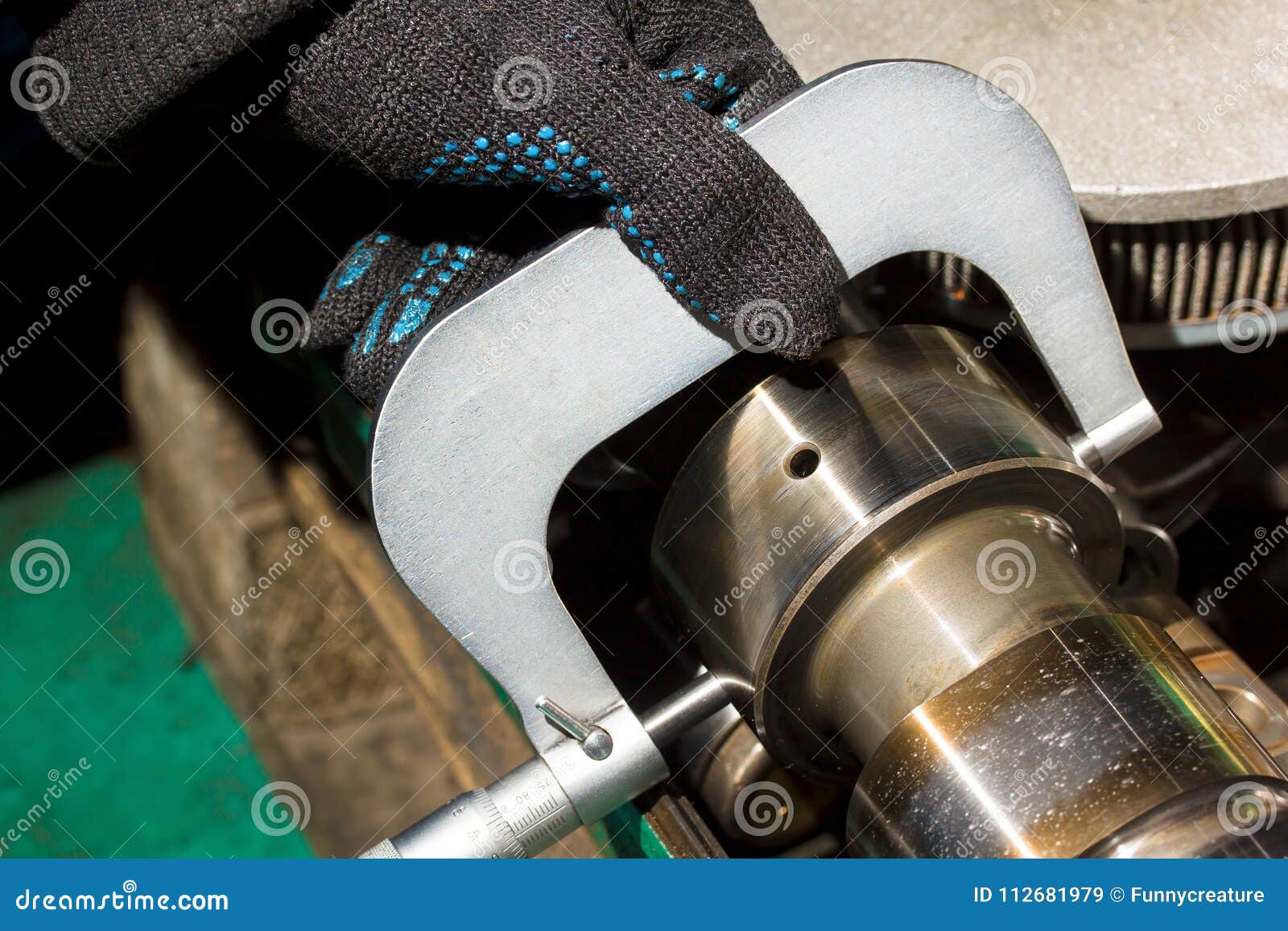 Manual Inspection of a Crankshaft with a Micrometer Stock Image Image