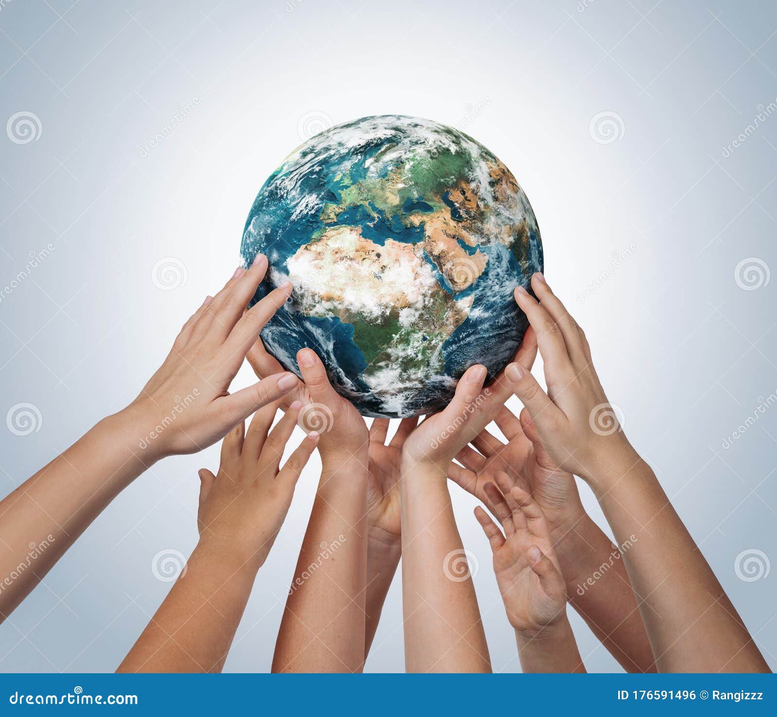 many children hands holding planet earth  on blue background